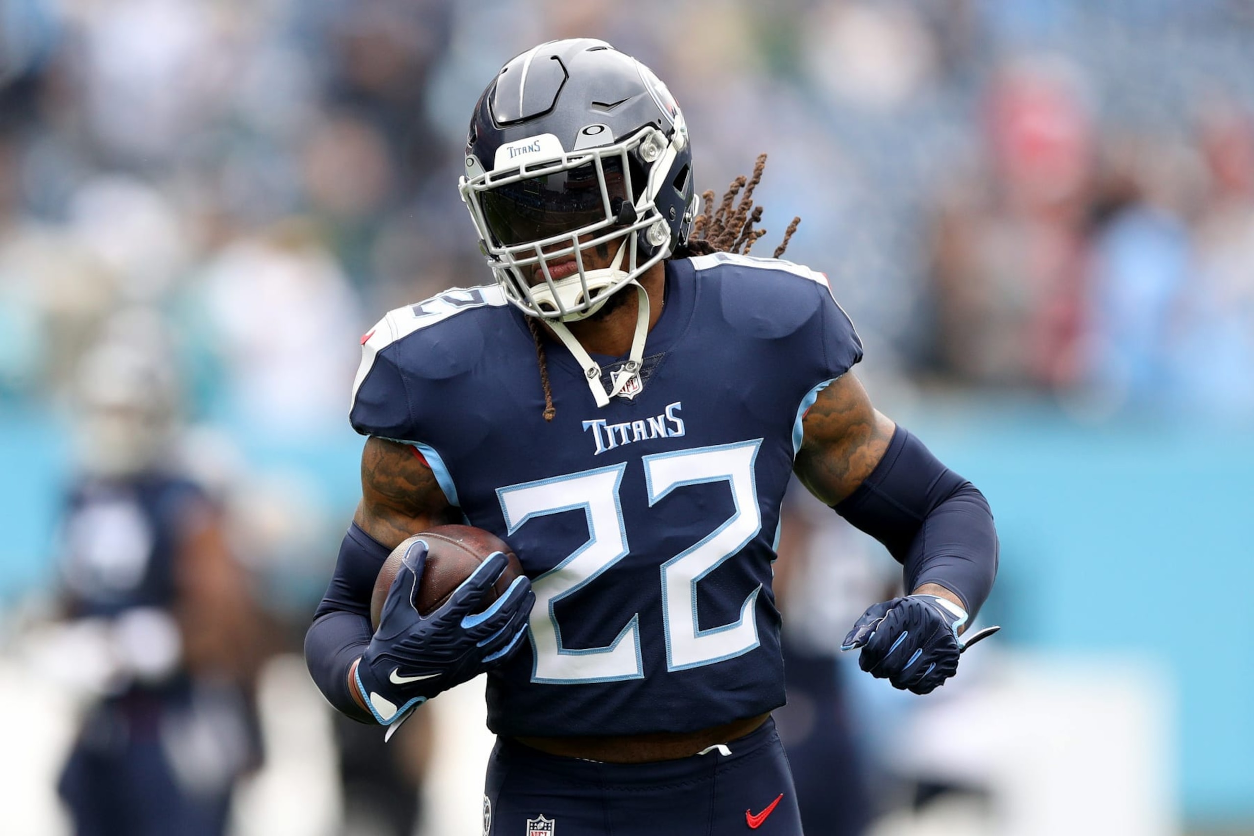 NASHVILLE, TENNESSEE - DECEMBER 11: Derrick Henry #22 of the Tennessee Titans warms up prior to the game against the Jacksonville Jaguars at Nissan Stadium on December 11, 2022 in Nashville, Tennessee. (Photo by Justin Ford/Getty Images)