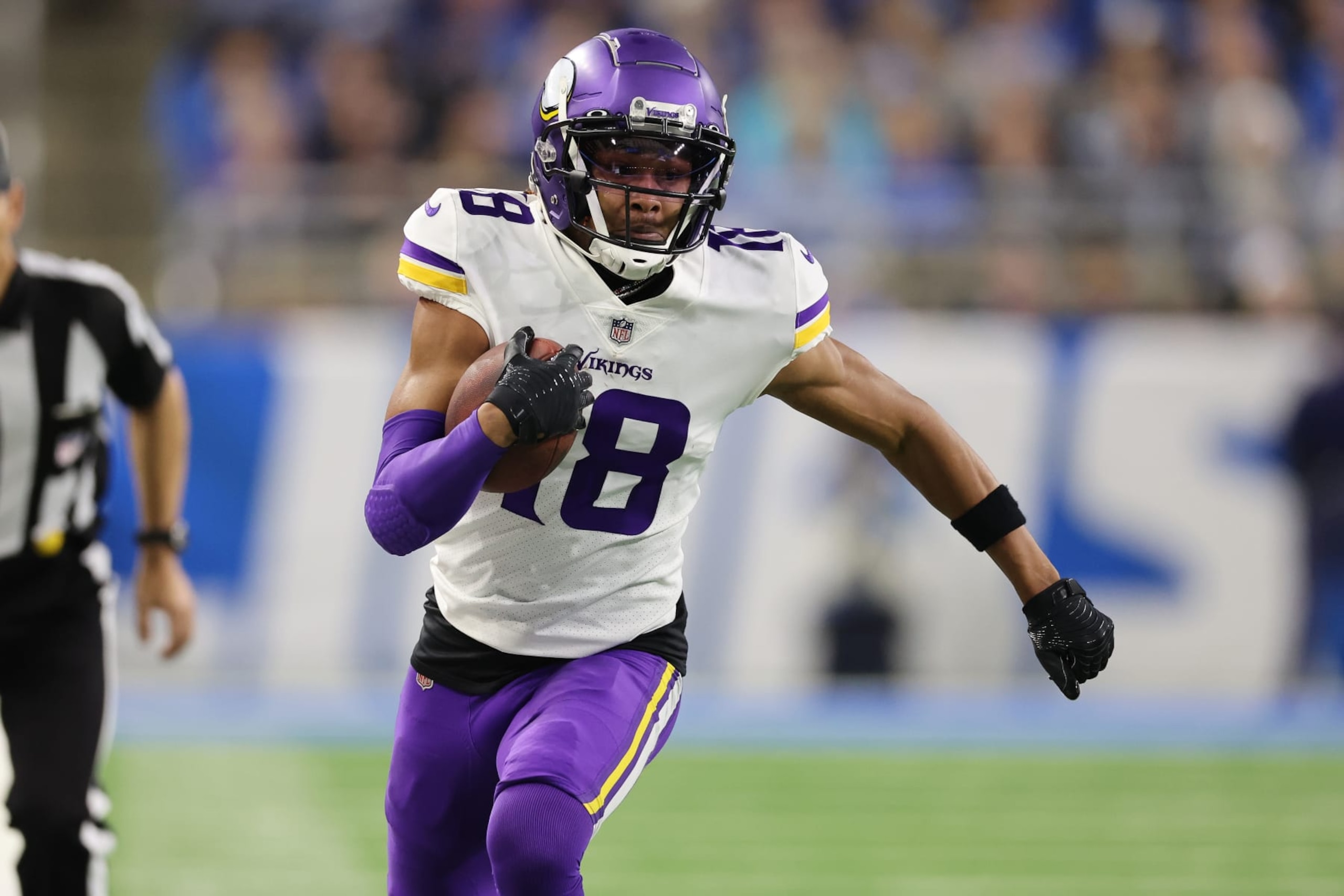 DETROIT, MICHIGAN - DECEMBER 11: Justin Jefferson #18 of the Minnesota Vikings plays against the Detroit Lions at Ford Field on December 11, 2022 in Detroit, Michigan. (Photo by Gregory Shamus/Getty Images)