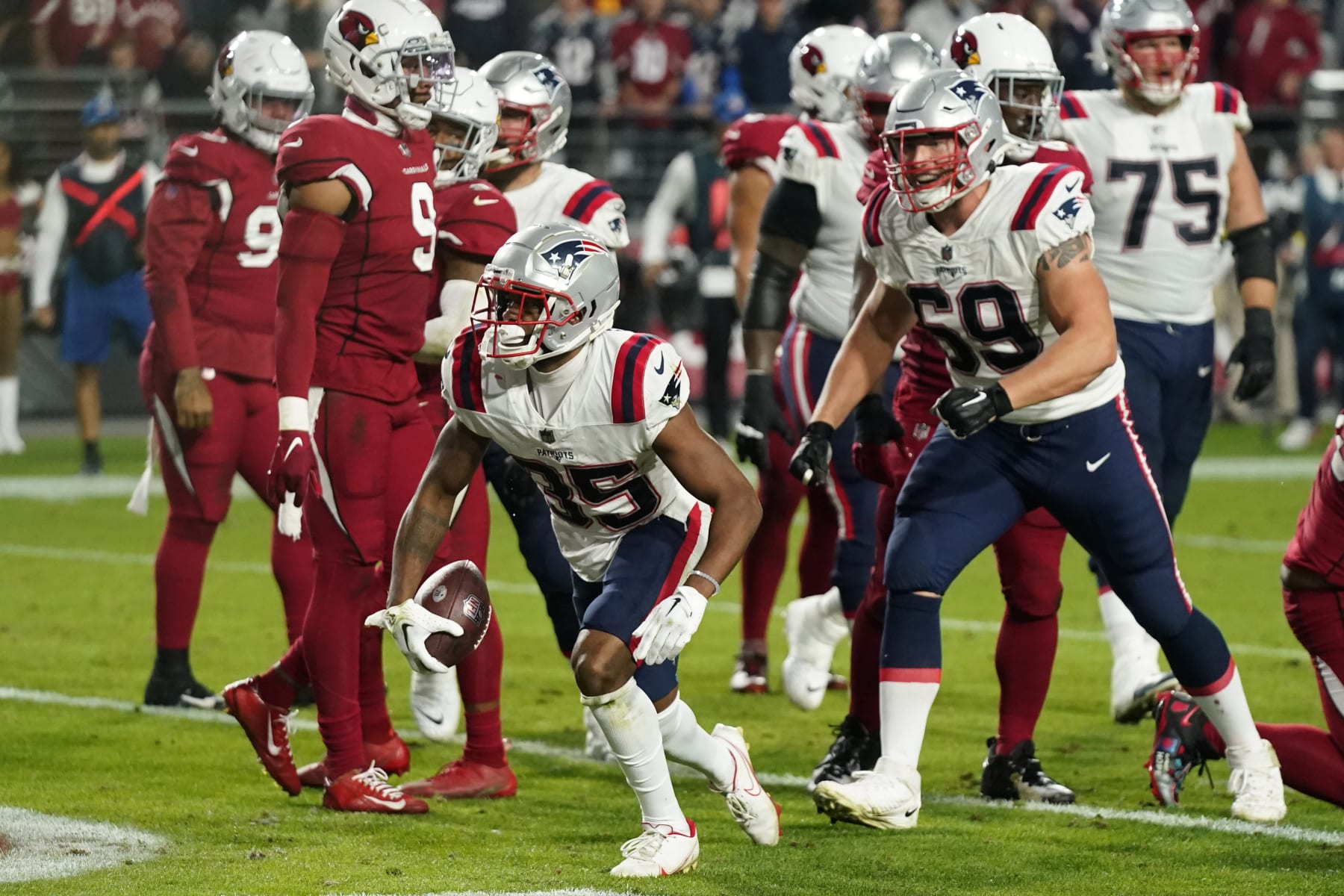 New England Patriots running back Pierre Strong Jr. reacts after scoring a touchdown against the Arizona Cardinals during the second half of an NFL football game, Monday, Dec. 12, 2022, in Glendale, Ariz. (AP Photo/Ross D. Franklin)