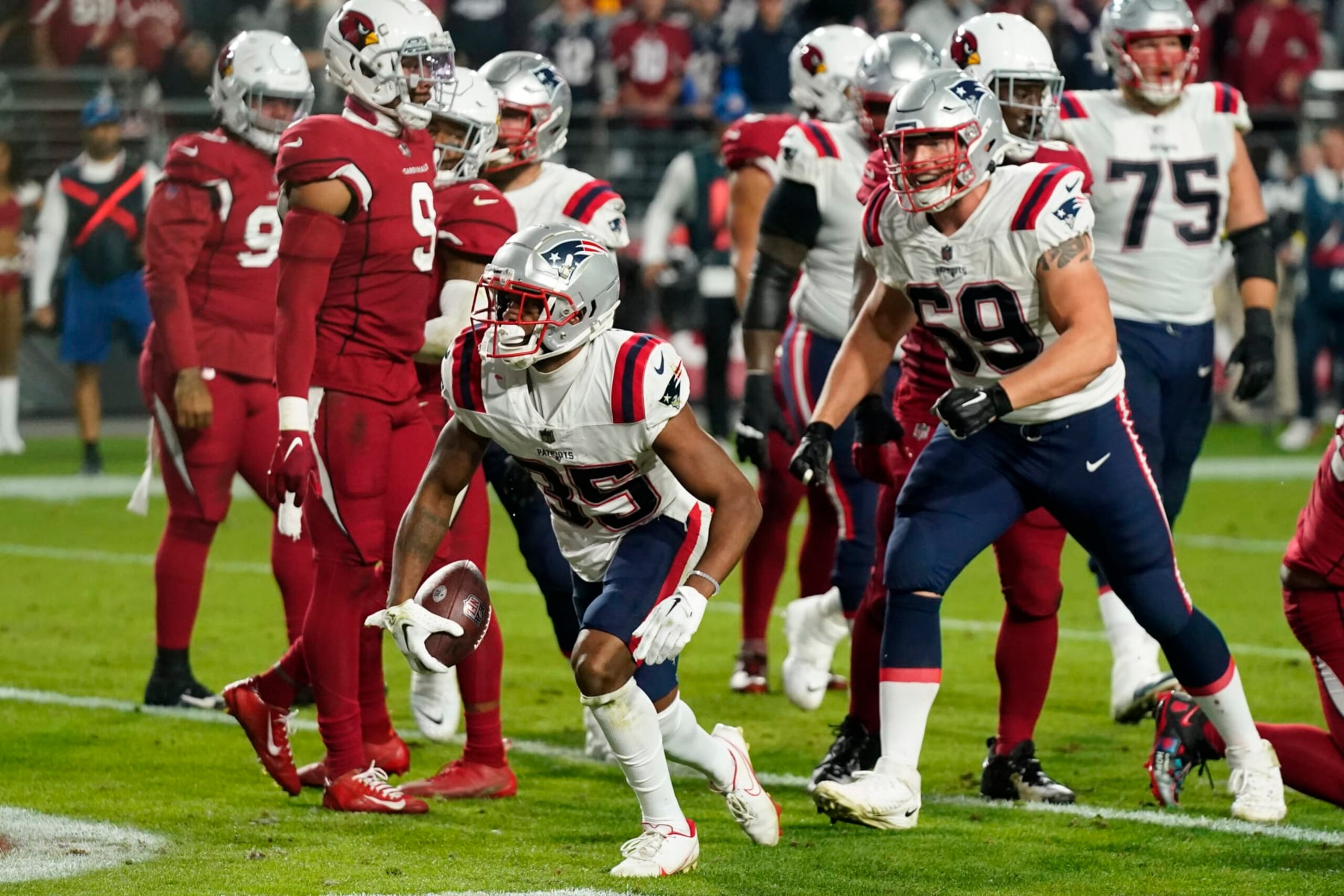 New England Patriots running back Pierre Strong Jr. reacts after scoring a touchdown against the Arizona Cardinals during the second half of an NFL football game, Monday, Dec. 12, 2022, in Glendale, Ariz. (AP Photo/Ross D. Franklin)