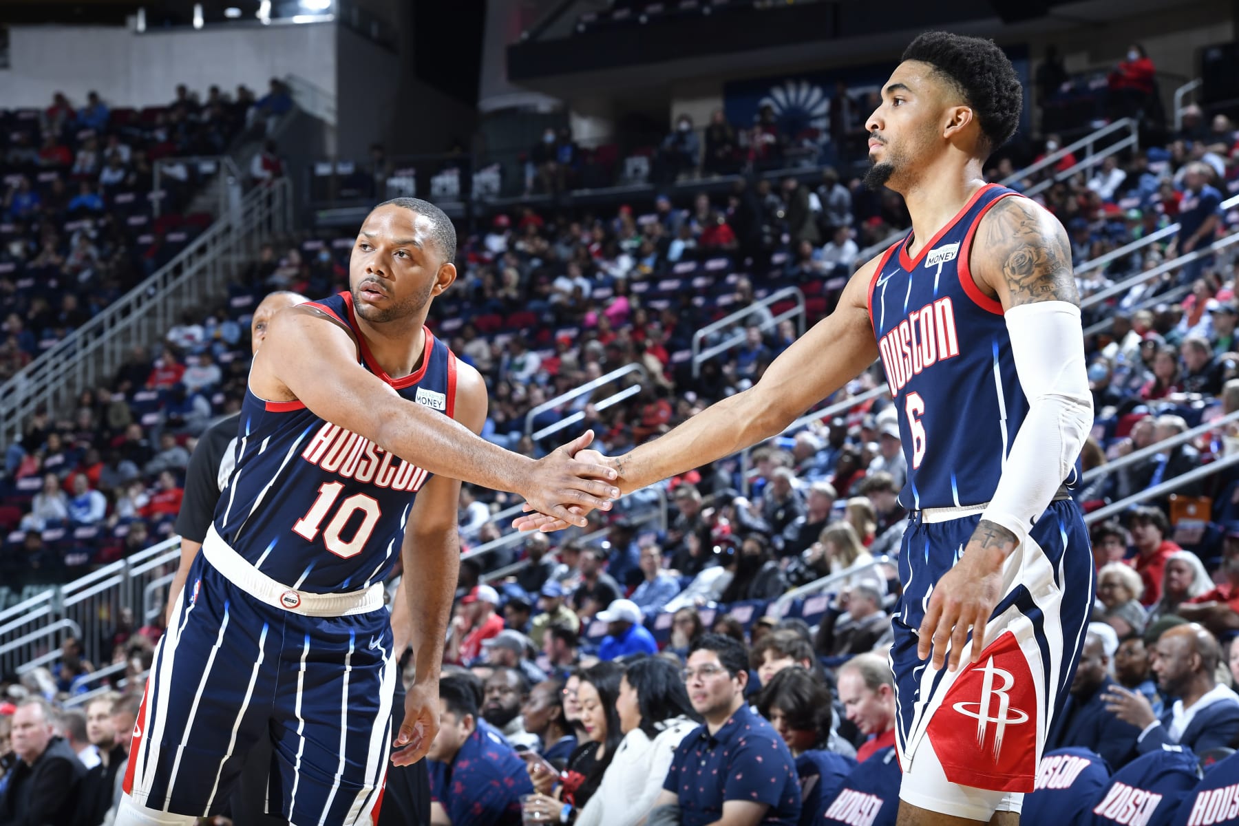 HOUSTON, TX - MARCH 11: Eric Gordon #10 of the Houston Rockets high fives Kenyon Martin Jr. #6 of the Houston Rockets during the game against the Dallas Mavericks on March 11, 2022 at the Toyota Center in Houston, Texas. NOTE TO USER: User expressly acknowledges and agrees that, by downloading and or using this photograph, User is consenting to the terms and conditions of the Getty Images License Agreement. Mandatory Copyright Notice: Copyright 2022 NBAE (Photo by Logan Riely/NBAE via Getty Images)