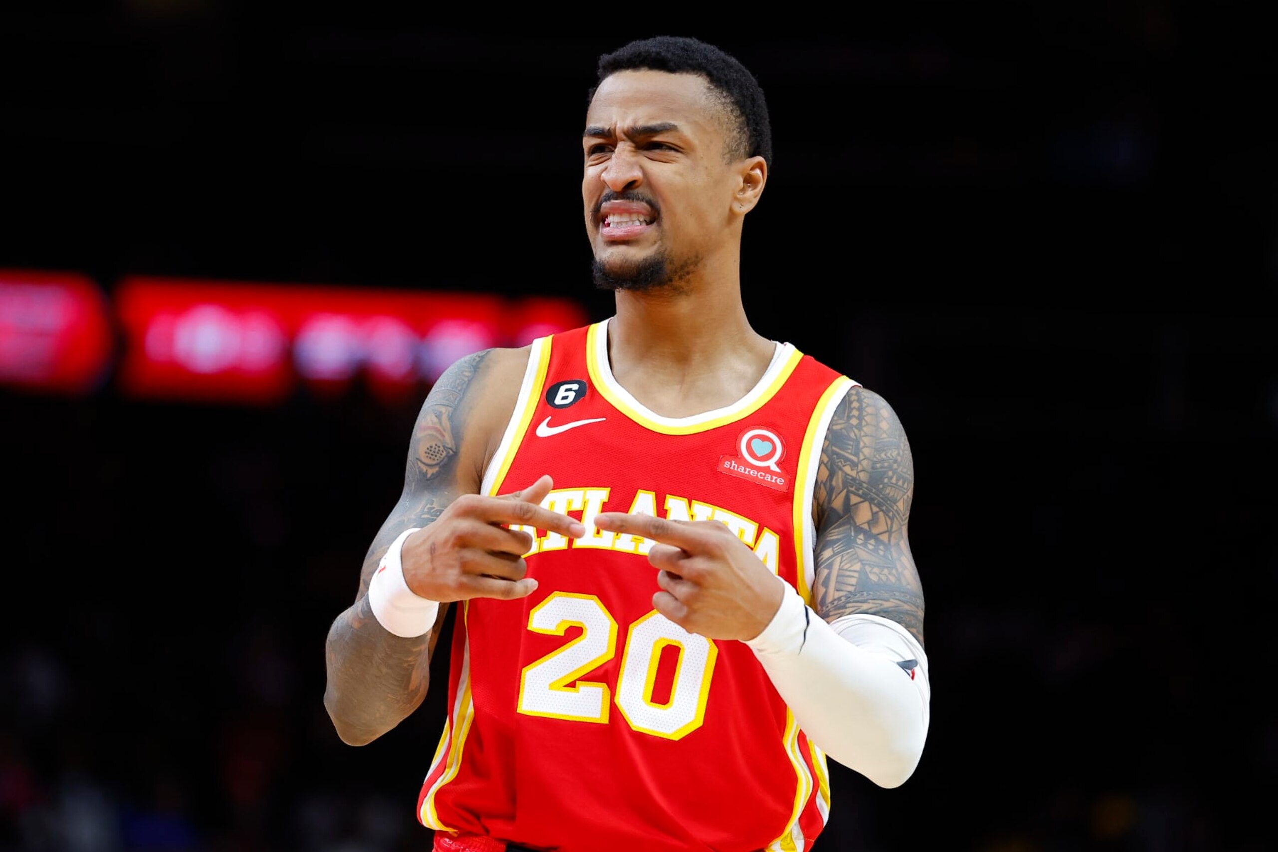 ATLANTA, GA - OCTOBER 23: John Collins #20 of the Atlanta Hawks reacts during the first half against the Charlotte Hornets at State Farm Arena on October 23, 2022 in Atlanta, Georgia. NOTE TO USER: User expressly acknowledges and agrees that, by downloading and or using this photograph, User is consenting to the terms and conditions of the Getty Images License Agreement. (Photo by Todd Kirkland/Getty Images)