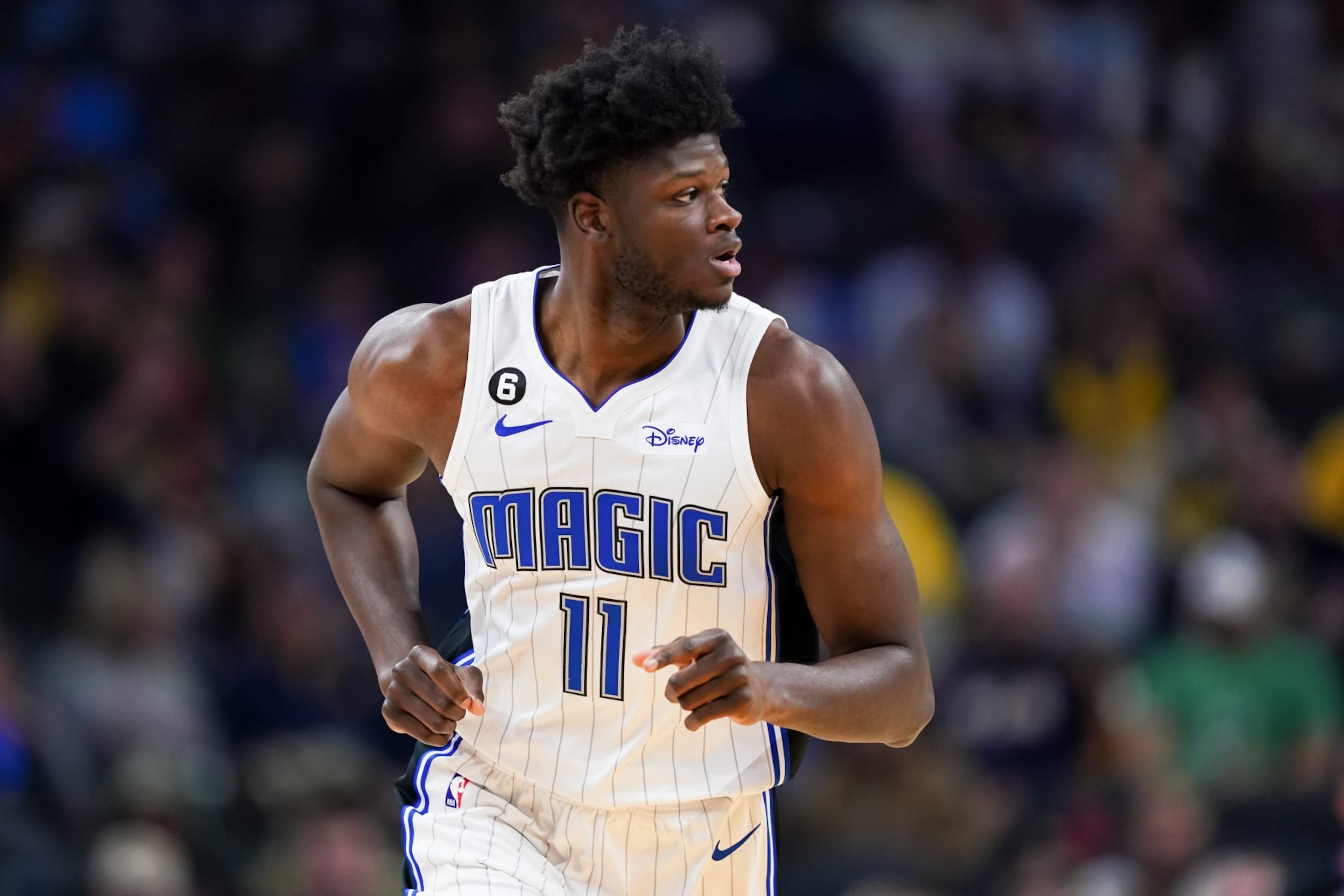 INDIANAPOLIS, INDIANA - NOVEMBER 19: Mo Bamba #11 of the Orlando Magic jogs across the court in the first quarter against the Indiana Pacers at Gainbridge Fieldhouse on November 19, 2022 in Indianapolis, Indiana. NOTE TO USER: User expressly acknowledges and agrees that, by downloading and or using this photograph, User is consenting to the terms and conditions of the Getty Images License Agreement. (Photo by Dylan Buell/Getty Images) INDIANAPOLIS, INDIANA - NOVEMBER 19: Mo Bamba #11 of the Orlando Magic jogs across the court in the first quarter against the Indiana Pacers at Gainbridge Fieldhouse on November 19, 2022 in Indianapolis, Indiana. NOTE TO USER: User expressly acknowledges and agrees that, by downloading and or using this photograph, User is consenting to the terms and conditions of the Getty Images License Agreement. (Photo by Dylan Buell/Getty Images)