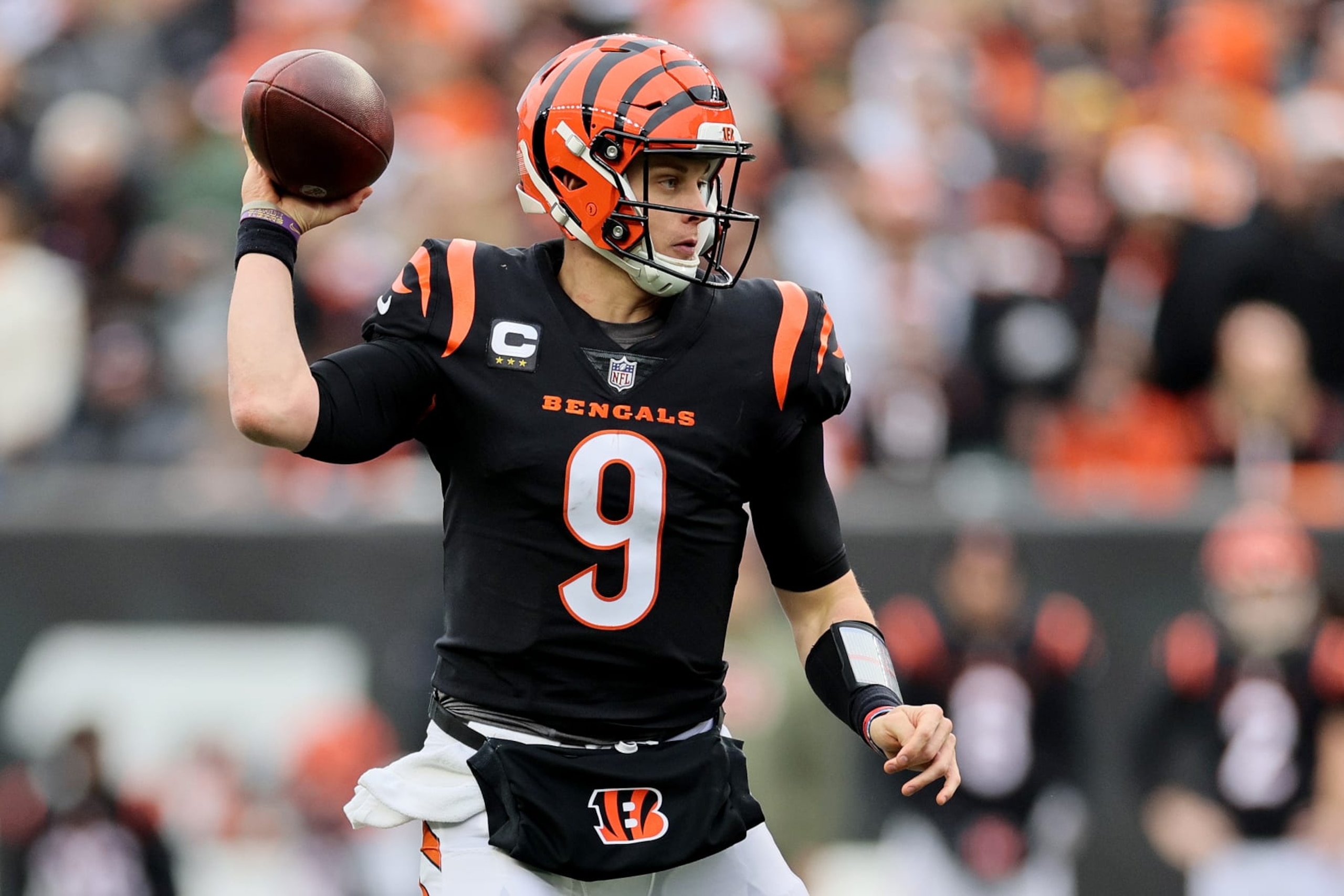 CINCINNATI, OHIO - DECEMBER 11: Joe Burrow #9 of the Cincinnati Bengals looks to pass in the first half of a game against the Cleveland Browns at Paycor Stadium on December 11, 2022 in Cincinnati, Ohio. (Photo by Andy Lyons/Getty Images)