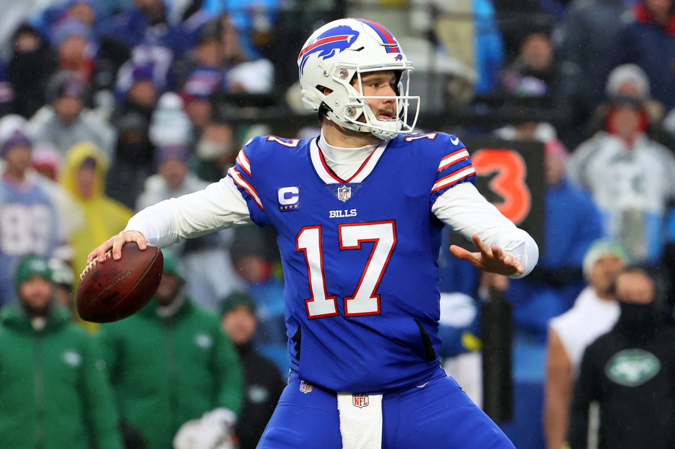 ORCHARD PARK, NEW YORK - DECEMBER 11: Josh Allen #17 of the Buffalo Bills looks to pass in the first half of a game against the New York Jets at Highmark Stadium on December 11, 2022 in Orchard Park, New York. (Photo by Timothy T Ludwig/Getty Images)