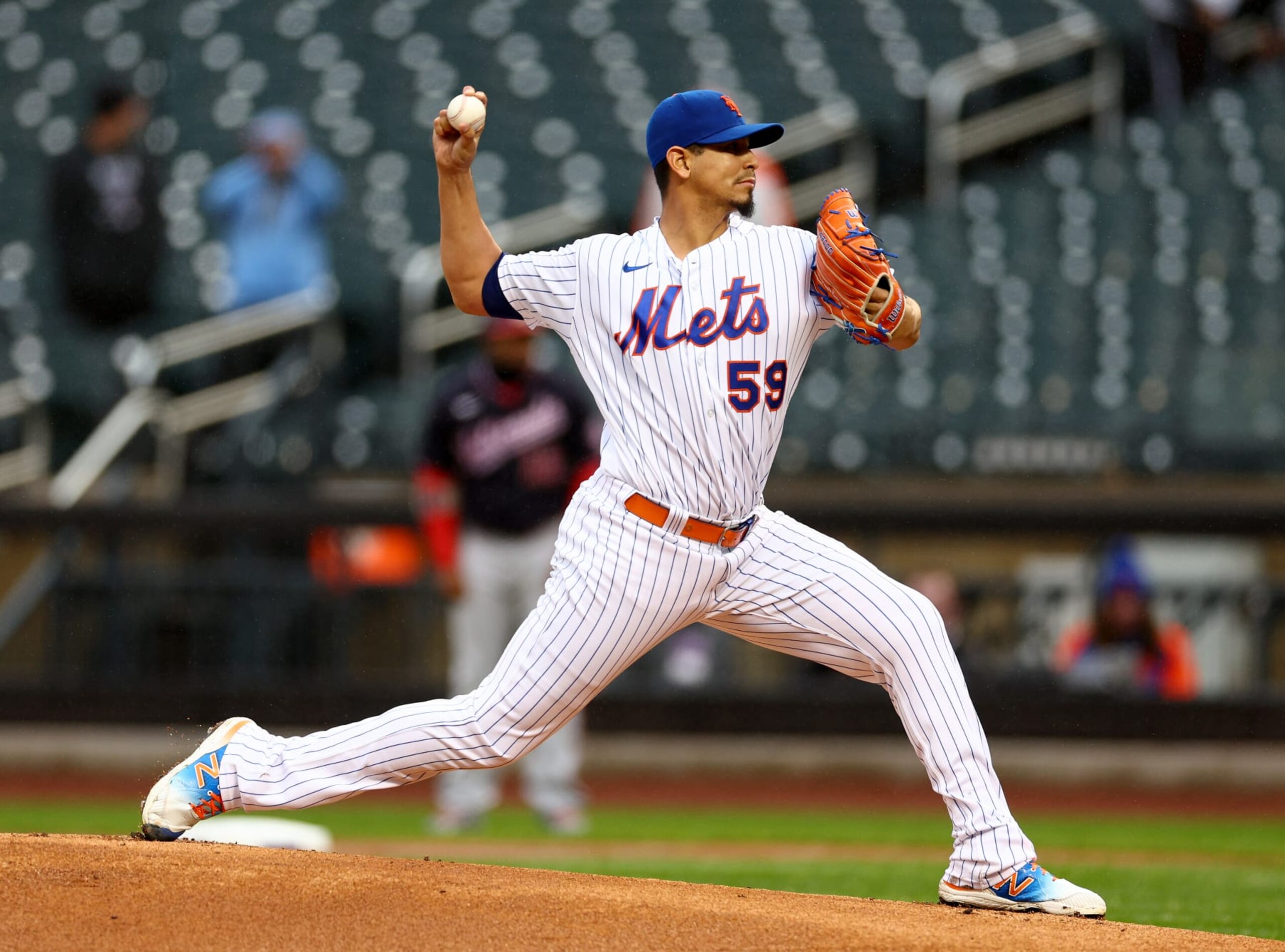NEW YORK, NEW YORK - OCTOBER 04: Carlos Carrasco #59 of the New York Mets delivers a pitch in the first inning against the Washington Nationals during game one of a double header at Citi Field on October 04, 2022 in the Flushing neighborhood of the Queens borough of New York City. (Photo by Elsa/Getty Images) NEW YORK, NEW YORK - OCTOBER 04: Carlos Carrasco #59 of the New York Mets delivers a pitch in the first inning against the Washington Nationals during game one of a double header at Citi Field on October 04, 2022 in the Flushing neighborhood of the Queens borough of New York City. (Photo by Elsa/Getty Images)