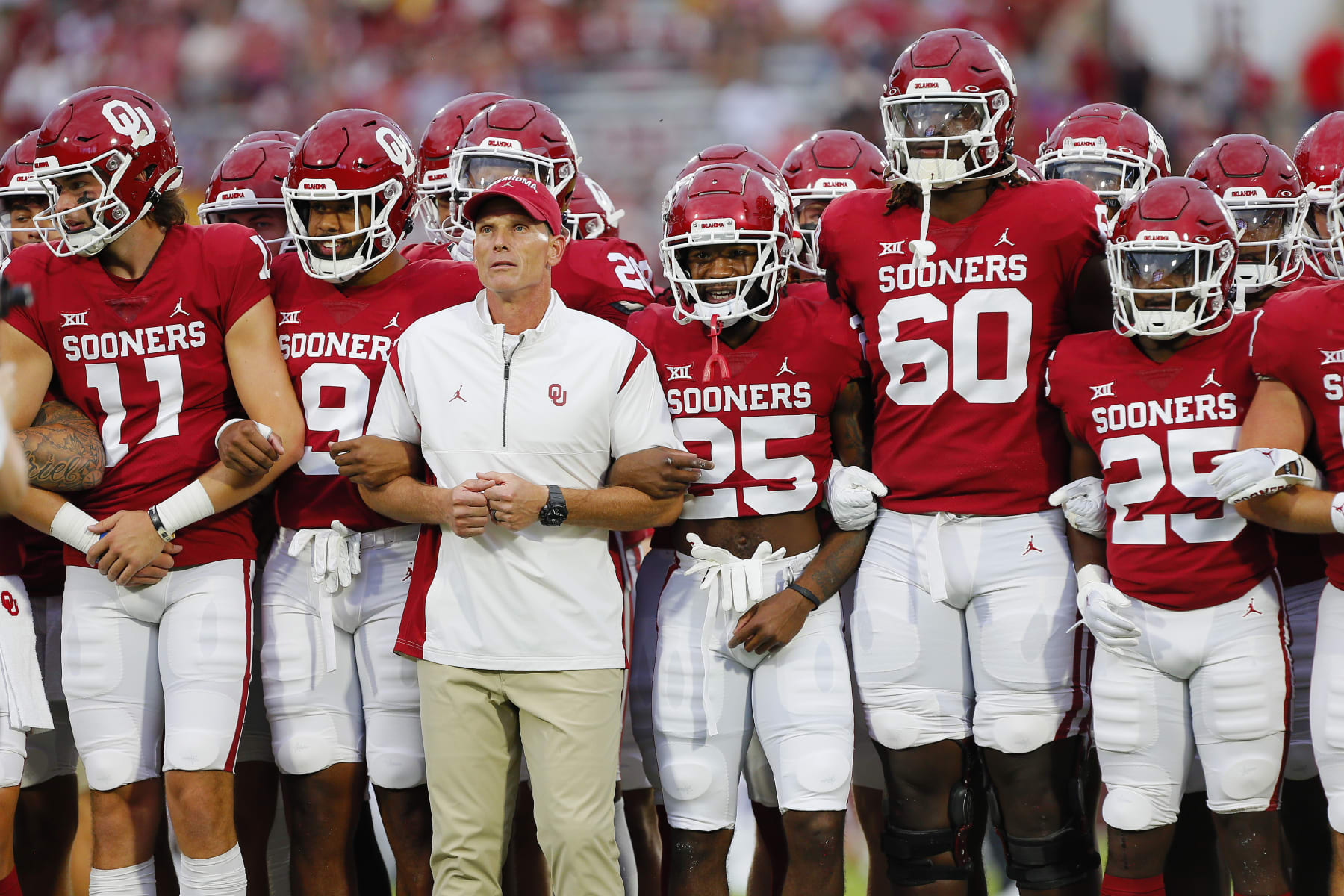 NORMAN, OK - SEPTEMBER 24:  Head coach Brent Venables and the Oklahoma Sooners march to the end zone arm in arm before a game against the Kansas State Wildcats at Gaylord Family Oklahoma Memorial Stadium on September 24, 2022 in Norman, Oklahoma.  Kansas State won 41-34.  (Photo by Brian Bahr/Getty Images)