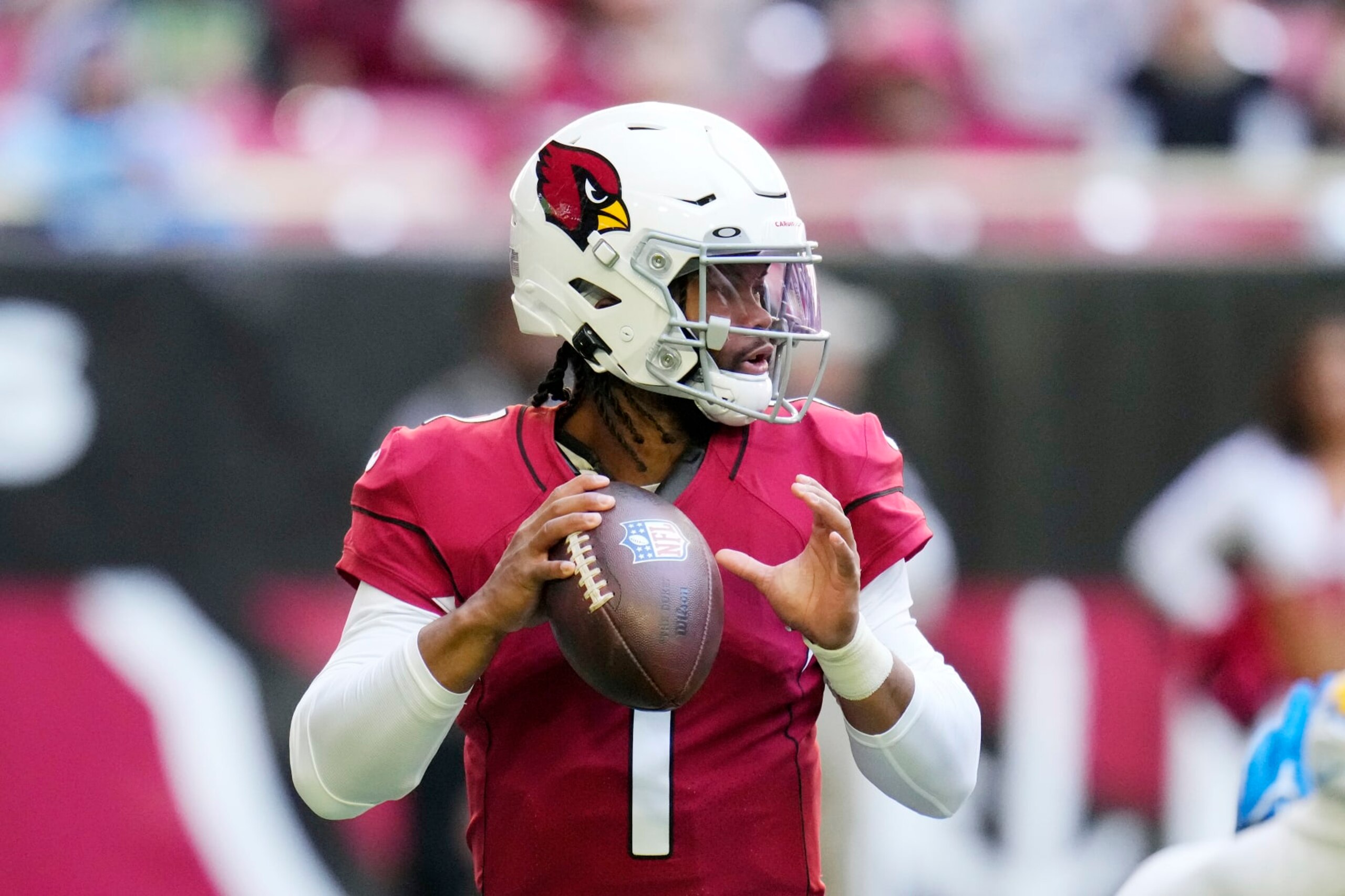 Arizona Cardinals quarterback Kyler Murray looks to pass the ball against the Los Angeles Chargers during the first half of an NFL football game in Glendale, Ariz., Sunday, Nov. 27, 2022. The Chargers won 25-24. (AP Photo/Ross D. Franklin) Arizona Cardinals quarterback Kyler Murray looks to pass the ball against the Los Angeles Chargers during the first half of an NFL football game in Glendale, Ariz., Sunday, Nov. 27, 2022. The Chargers won 25-24. (AP Photo/Ross D. Franklin)