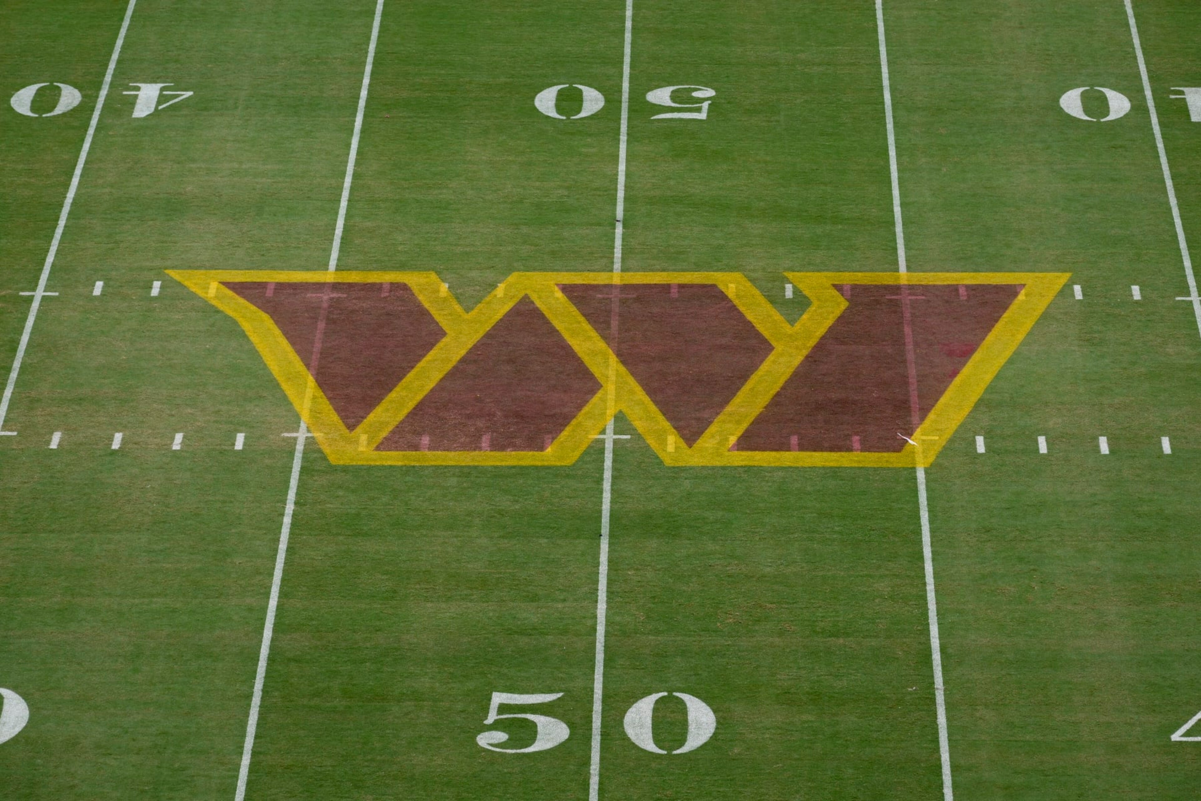 The Washington Commanders logo is seen on the field before a NFL football game between the Washington Commanders and the Jacksonville Jaguars, Sunday, Sept. 11, 2022, in Landover, Md. (AP Photo/Nick Wass) The Washington Commanders logo is seen on the field before a NFL football game between the Washington Commanders and the Jacksonville Jaguars, Sunday, Sept. 11, 2022, in Landover, Md. (AP Photo/Nick Wass)