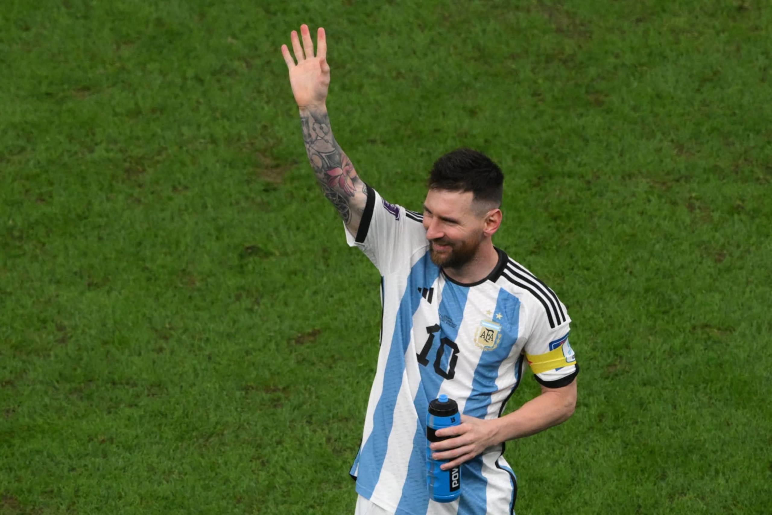 Argentina's forward #10 Lionel Messi waves at the end of the Qatar 2022 World Cup football semi-final match between Argentina and Croatia at Lusail Stadium in Lusail, north of Doha on December 13, 2022. (Photo by Paul ELLIS / AFP) (Photo by PAUL ELLIS/AFP via Getty Images)