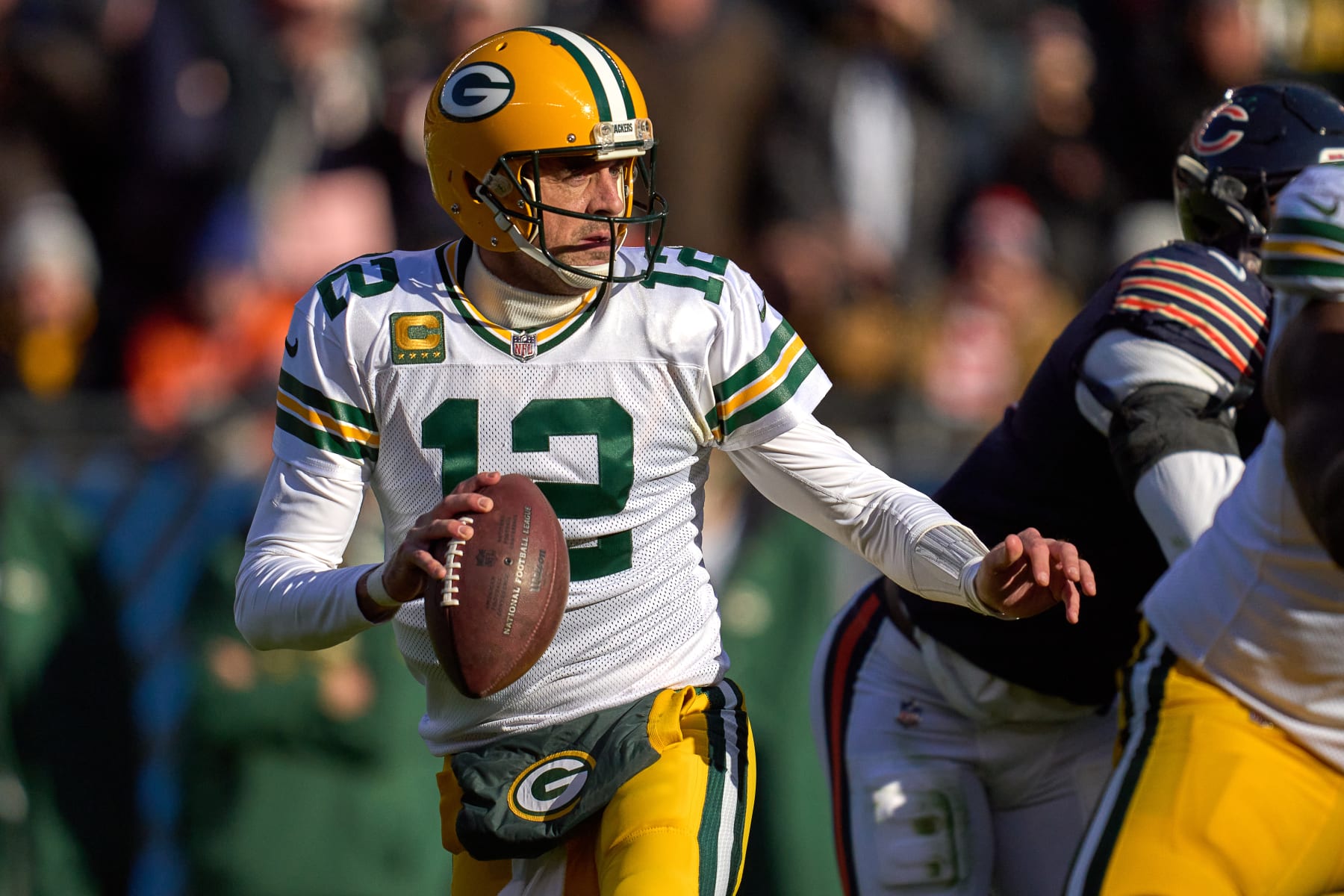 CHICAGO, IL - DECEMBER 04: Green Bay Packers quarterback Aaron Rodgers (12) looks to throw the football in action during a game between the Green Bay Packers and the Chicago Bears on December 04, 2022, at Soldier Field in Chicago, IL. (Photo by Robin Alam/Icon Sportswire via Getty Images)