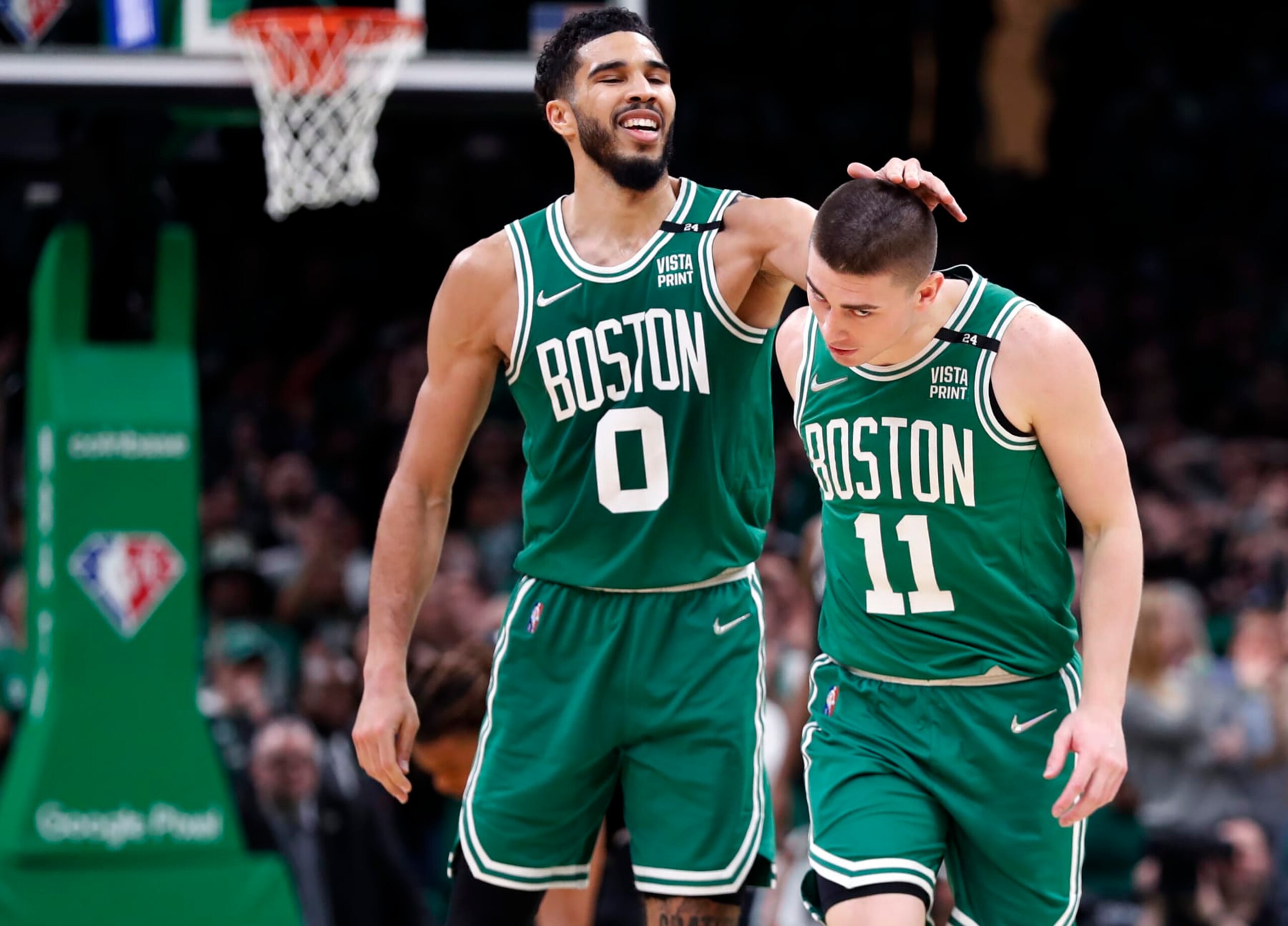 Boston - April 20: After the Celtics Payton Pritchard (right) hit one of his several big shots in the fourth quarter to help seal the Boston win, he gets a head rub from teammate Jayson Tatum (left). The Boston Celtics hosted the Brooklyn Nets for Game Two of their first round NBA Playoff series held at the TD Garden in Boston on April 20, 2022. (Photo by Jim Davis/The Boston Globe via Getty Images) Boston - April 20: After the Celtics Payton Pritchard (right) hit one of his several big shots in the fourth quarter to help seal the Boston win, he gets a head rub from teammate Jayson Tatum (left). The Boston Celtics hosted the Brooklyn Nets for Game Two of their first round NBA Playoff series held at the TD Garden in Boston on April 20, 2022. (Photo by Jim Davis/The Boston Globe via Getty Images)
