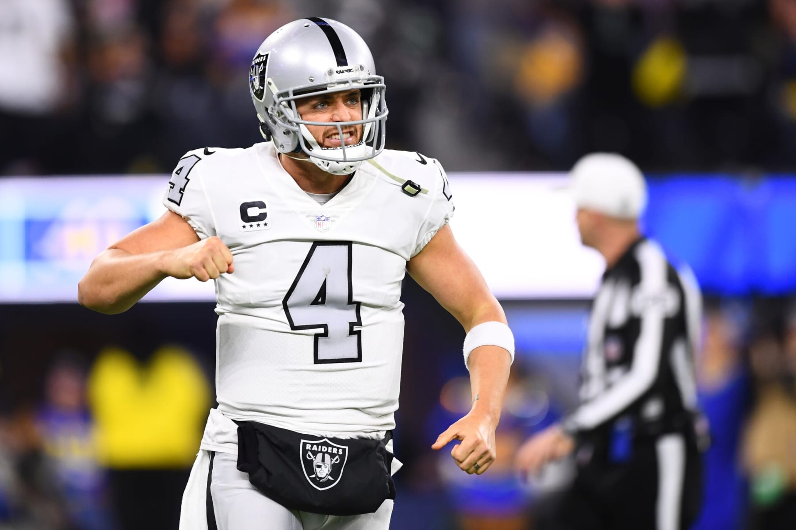 INGLEWOOD, CA - DECEMBER 08: Oakland Raiders quarterback Derek Carr (4) celebrates a touchdown during the NFL game between the Oakland Raiders and the Los Angeles Rams on December 8, 2022, at SoFi Stadium in Inglewood, CA. (Photo by Brian Rothmuller/Icon Sportswire via Getty Images)