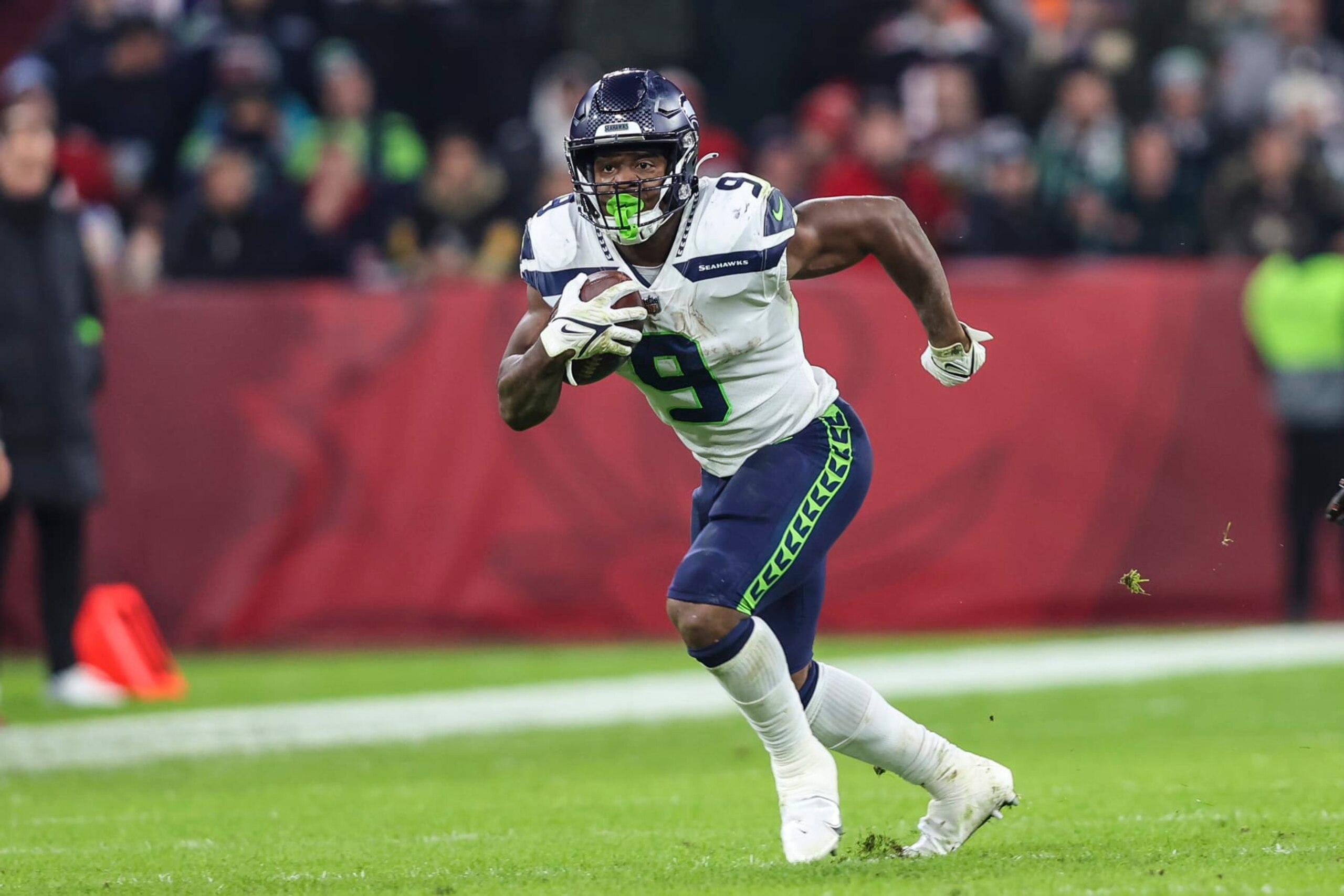 Seattle Seahawks running back Kenneth Walker III (9) runs the ball during an NFL football game against the Tampa Bay Buccaneers on Nov. 13, 2022, in Munich. The Buccaneers defeated the Seahawks 21-16. (AP Photo/Gary McCullough)