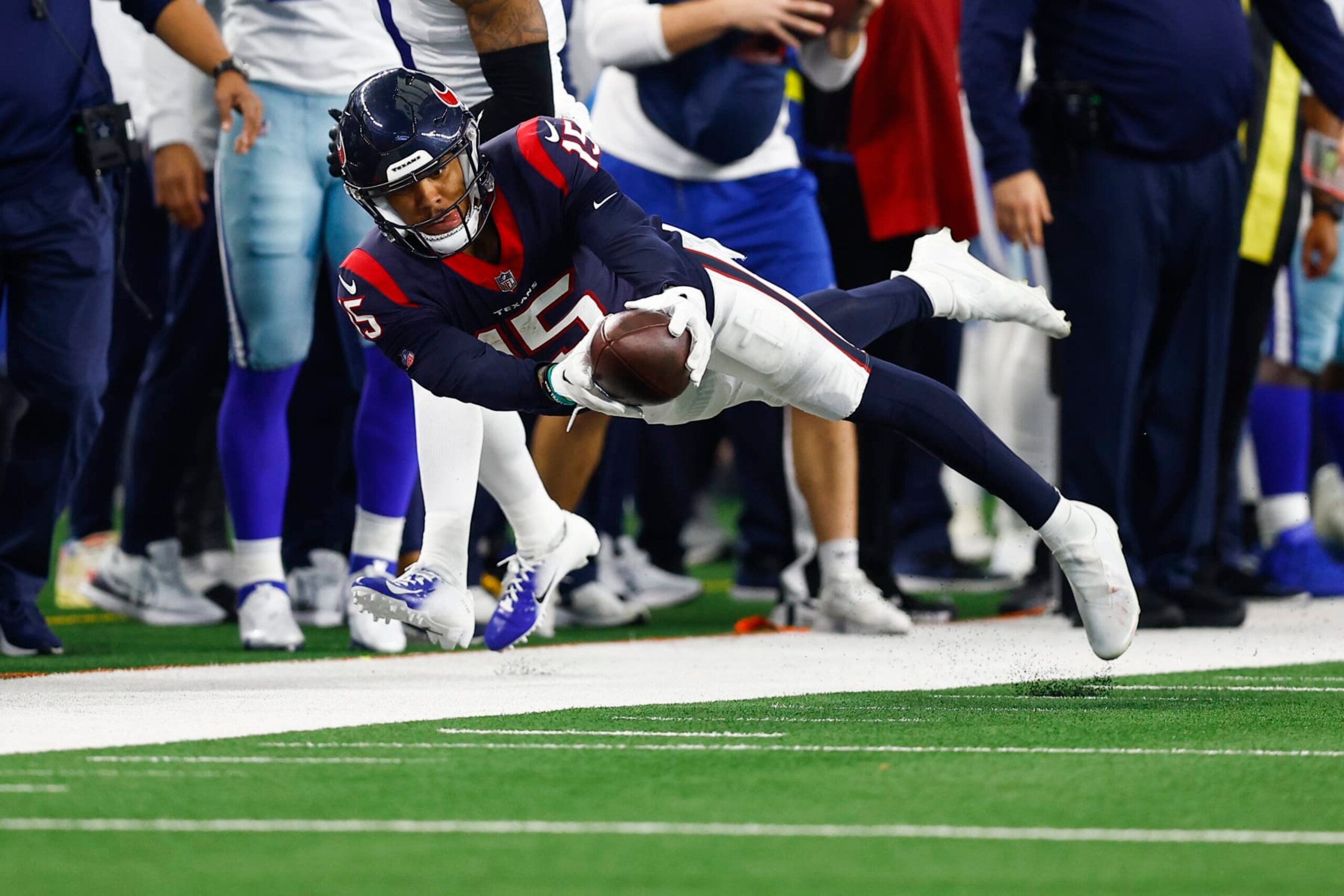 Houston Texans wide receiver Chris Moore (15) is seen during the second half of an NFL football game, Sunday, Dec. 11, 2022, in Arlington, Texas. Dallas won 27-23. (AP Photo/Brandon Wade)