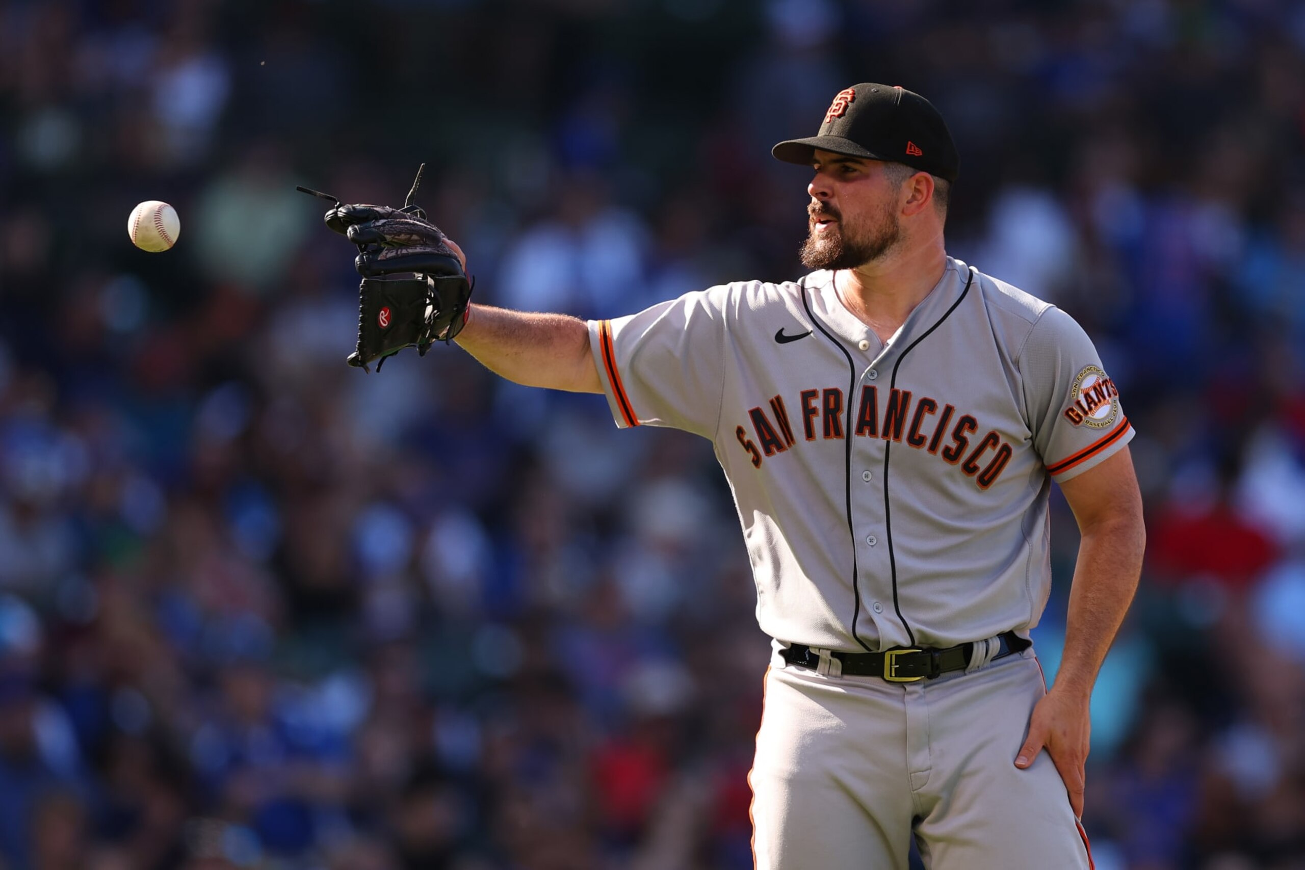CHICAGO, ILLINOIS - SEPTEMBER 09: Carlos Rodon #16 of the San Francisco Giants reacts against the Chicago Cubs at Wrigley Field on September 09, 2022 in Chicago, Illinois. (Photo by Michael Reaves/Getty Images)