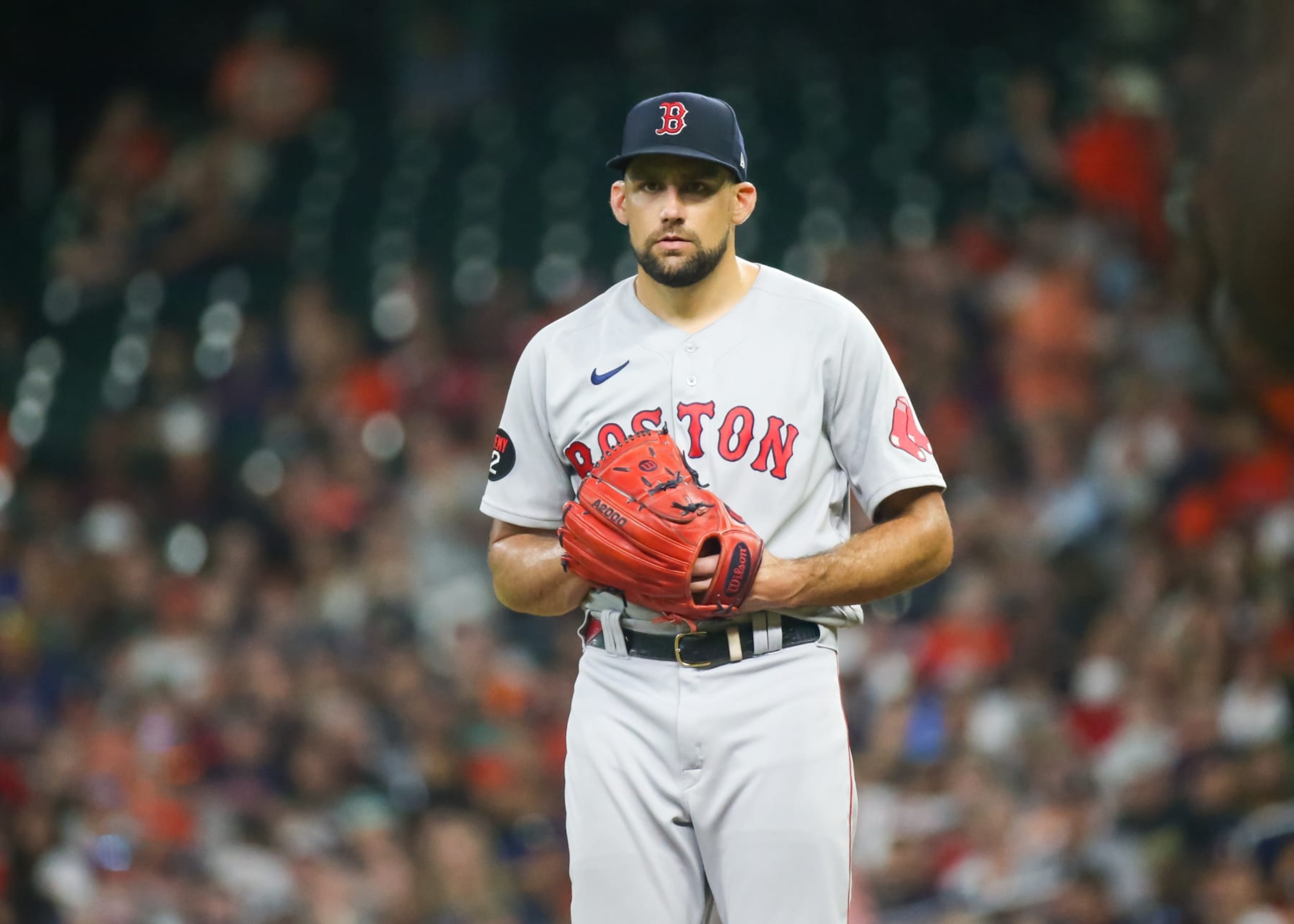 HOUSTON, TX - AUGUST 01:  Boston Red Sox starting pitcher Nathan Eovaldi (17) looks toward the outfield during the MLB game between the Boston Red Sox and Houston Astros on August 1, 2022 at Minute Maid Park in Houston, Texas.  (Photo by Leslie Plaza Johnson/Icon Sportswire via Getty Images)