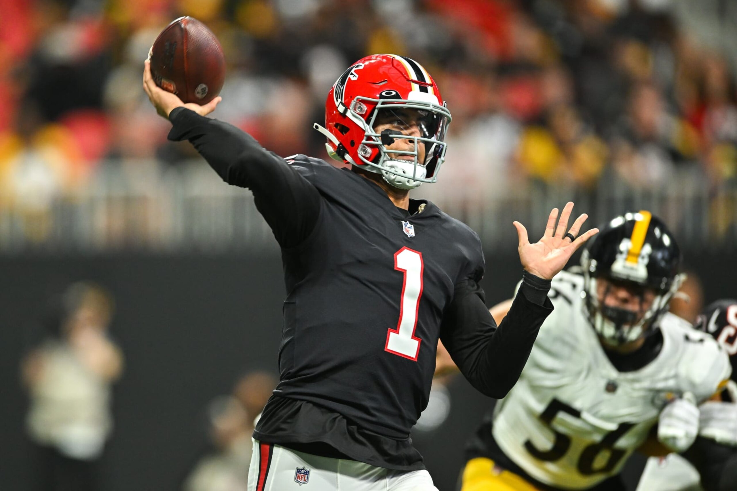 ATLANTA, GA  DECEMBER 04:  Atlanta quarterback Marcus Mariota (1) throws a pass during the NFL game between the Pittsburgh Steelers and the Atlanta Falcons on December 4th, 2022 at Mercedes-Benz Stadium in Atlanta, GA.  (Photo by Rich von Biberstein/Icon Sportswire via Getty Images)