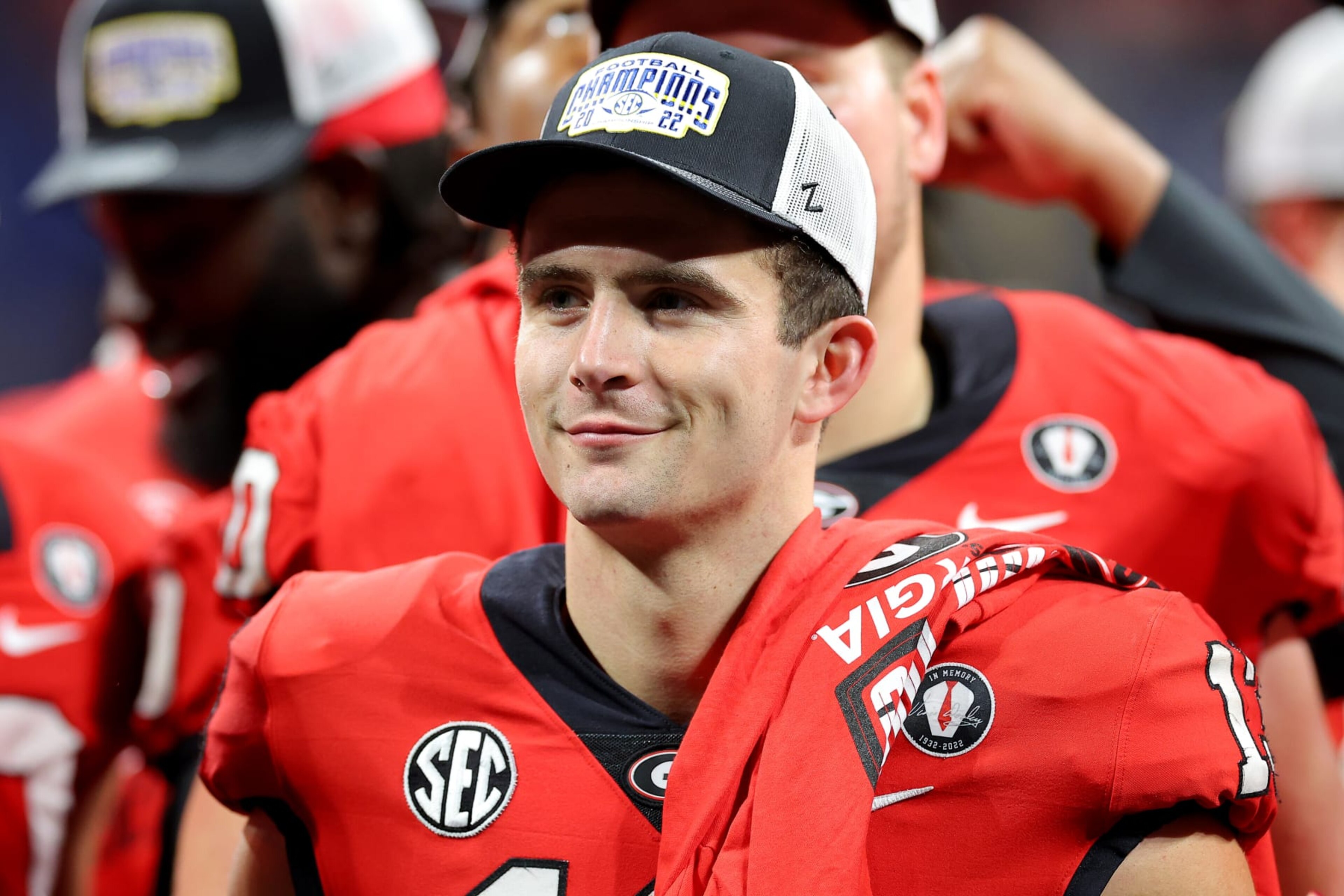 ATLANTA, GEORGIA - DECEMBER 03: Stetson Bennett #13 of the Georgia Bulldogs celebrates after defeating the LSU Tigers in the SEC Championship game at Mercedes-Benz Stadium on December 03, 2022 in Atlanta, Georgia. (Photo by Kevin C. Cox/Getty Images)