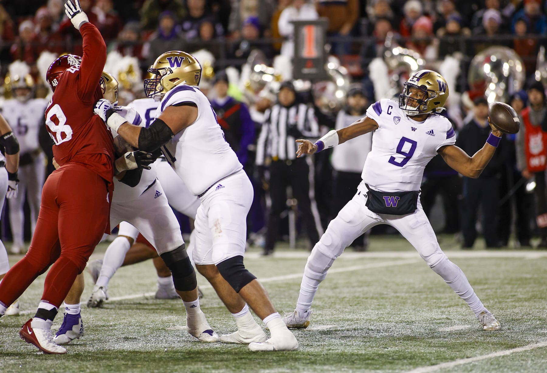 PULLMAN, WA - NOVEMBER 26: Washington Huskies quarterback Michael Penix Jr. (9) throws a pass during the game between the Washington Huskies and the Washington State Cougars on November 26, 2022, at Martin Stadium in Pullman, WA. (Photo by Oliver McKenna/Icon Sportswire via Getty Images)