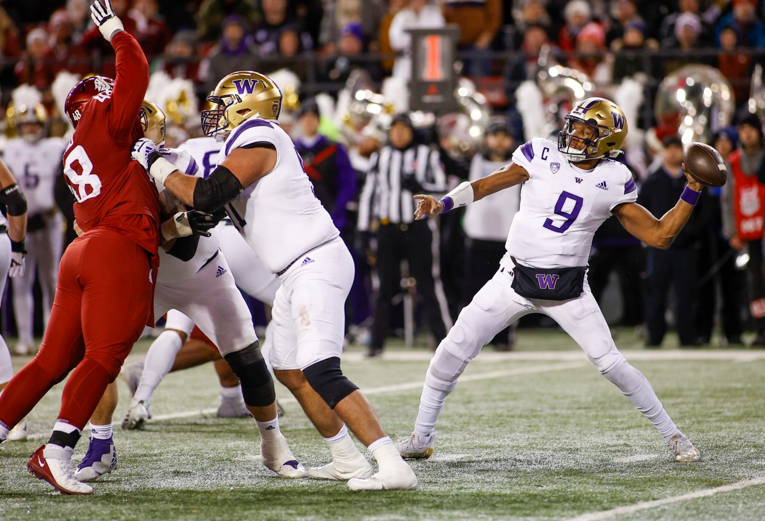 PULLMAN, WA - NOVEMBER 26: Washington Huskies quarterback Michael Penix Jr. (9) throws a pass during the game between the Washington Huskies and the Washington State Cougars on November 26, 2022, at Martin Stadium in Pullman, WA. (Photo by Oliver McKenna/Icon Sportswire via Getty Images) PULLMAN, WA - NOVEMBER 26: Washington Huskies quarterback Michael Penix Jr. (9) throws a pass during the game between the Washington Huskies and the Washington State Cougars on November 26, 2022, at Martin Stadium in Pullman, WA. (Photo by Oliver McKenna/Icon Sportswire via Getty Images)
