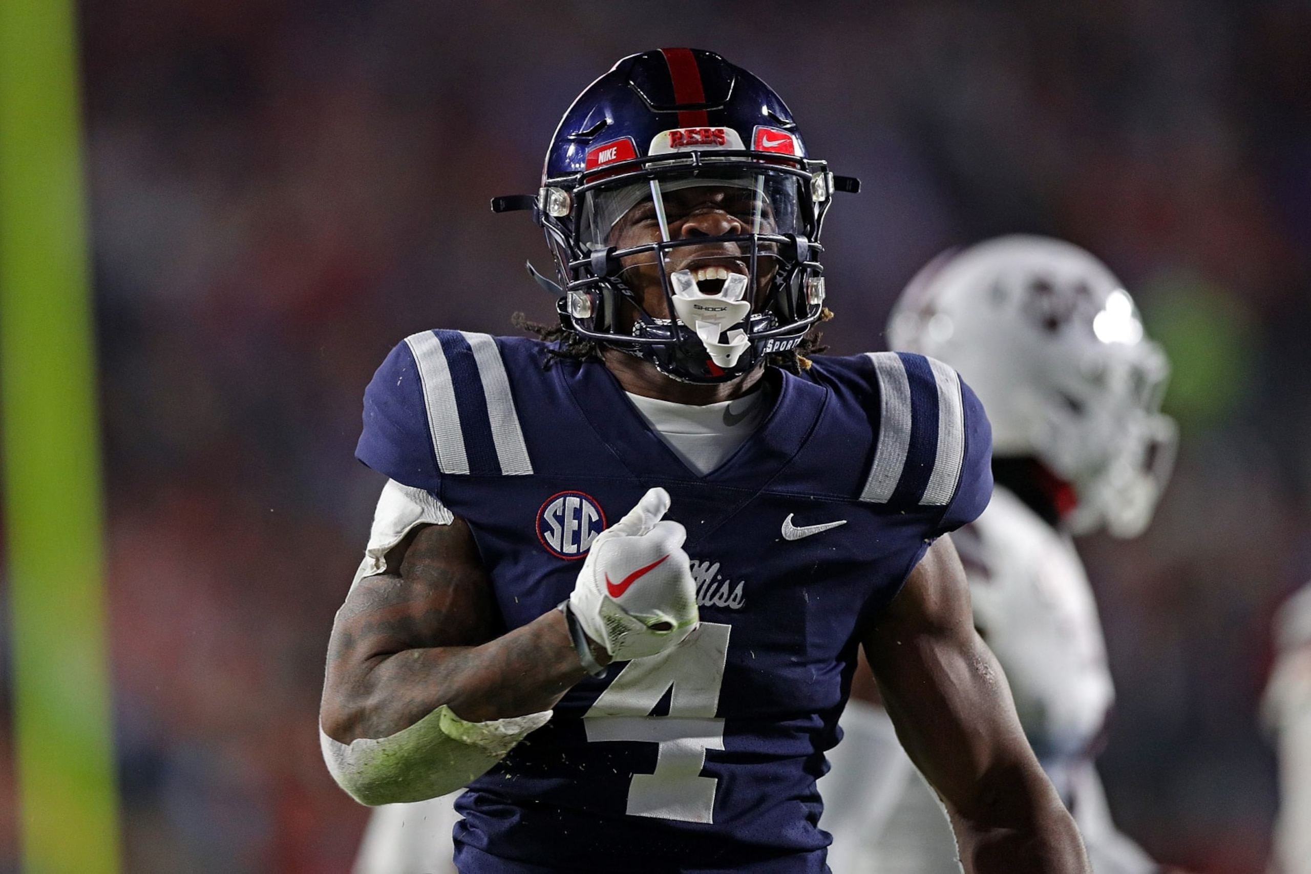 OXFORD, MISSISSIPPI - NOVEMBER 24: Quinshon Judkins #4 of the Mississippi Rebels reacts during the first half against the Mississippi State Bulldogs at Vaught-Hemingway Stadium on November 24, 2022 in Oxford, Mississippi. (Photo by Justin Ford/Getty Images) OXFORD, MISSISSIPPI - NOVEMBER 24: Quinshon Judkins #4 of the Mississippi Rebels reacts during the first half against the Mississippi State Bulldogs at Vaught-Hemingway Stadium on November 24, 2022 in Oxford, Mississippi. (Photo by Justin Ford/Getty Images)