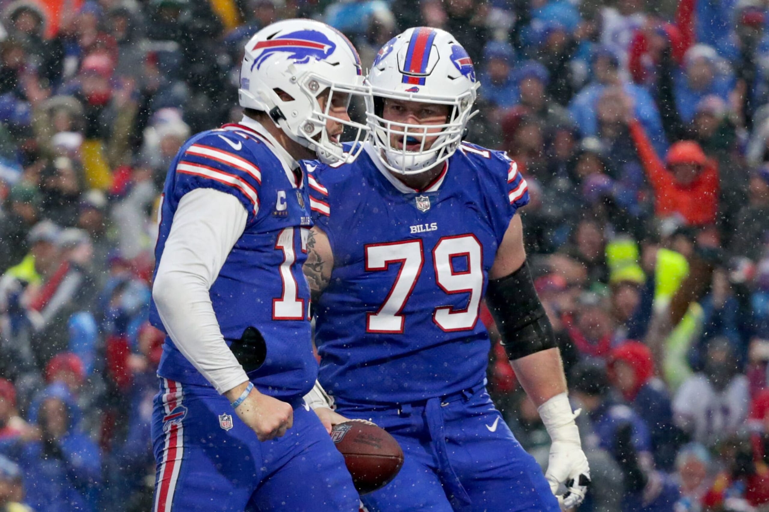 ORCHARD PARK, NEW YORK - DECEMBER 11: Josh Allen #17 and Spencer Brown #79 of the Buffalo Bills react in the second half of a game against the New York Jets at Highmark Stadium on December 11, 2022 in Orchard Park, New York. (Photo by Joshua Bessex/Getty Images)