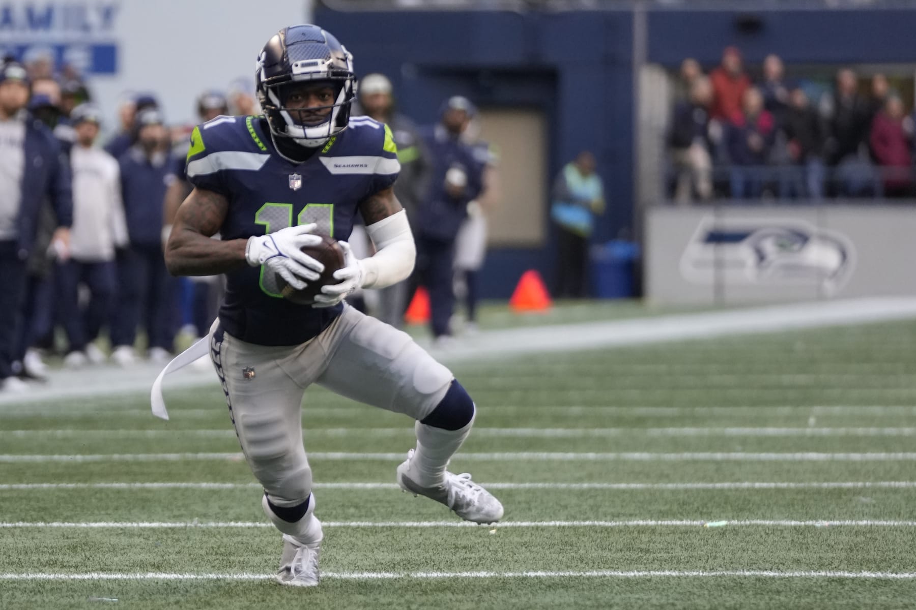 Seattle Seahawks wide receiver Marquise Goodwin (11) runs with the ball during an NFL football game against the Carolina Panthers, Sunday, Dec. 11, 2022, in Seattle, WA. The Panthers defeated the Seahawks 30-24. (AP Photo/Ben VanHouten)