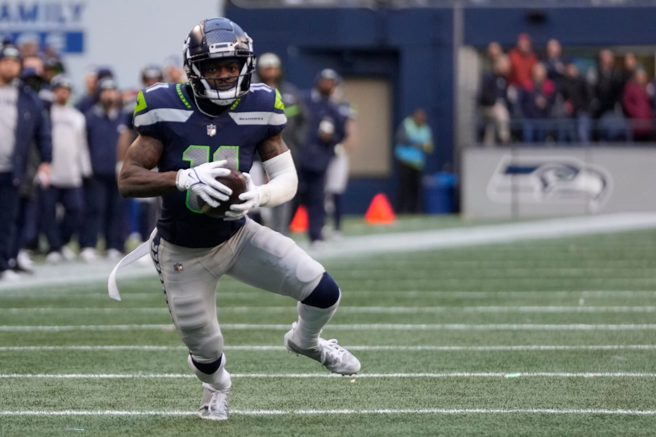 Seattle Seahawks wide receiver Marquise Goodwin (11) runs with the ball during an NFL football game against the Carolina Panthers, Sunday, Dec. 11, 2022, in Seattle, WA. The Panthers defeated the Seahawks 30-24. (AP Photo/Ben VanHouten)