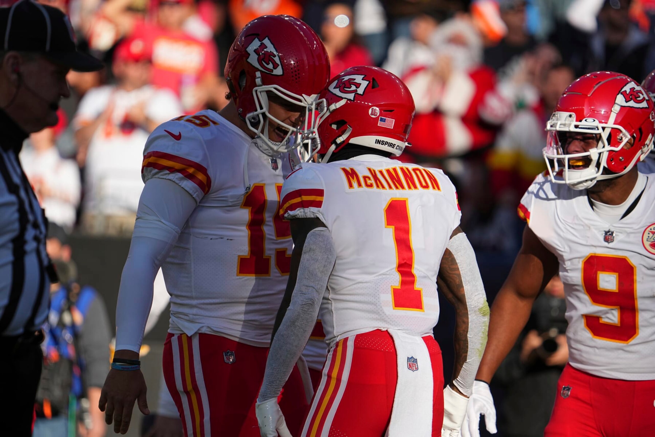 Kansas City Chiefs quarterback Patrick Mahomes (15) plays against the Denver Broncos of an NFL football game Sunday, December 11, 2022, in Denver. (AP Photo/Bart Young)