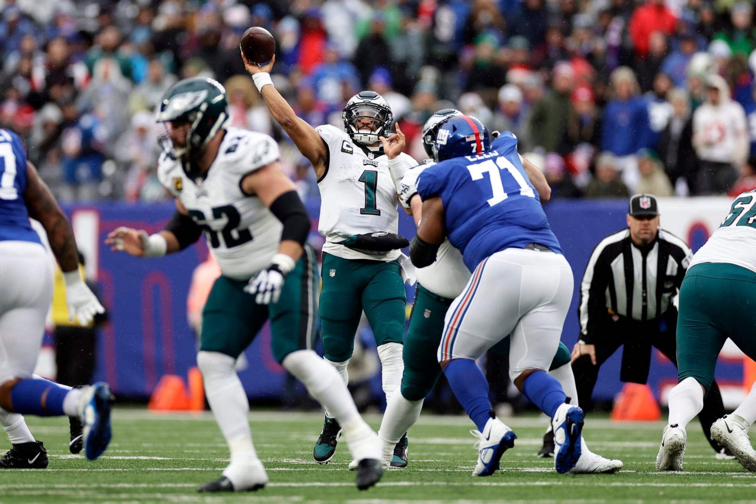Philadelphia Eagles quarterback Jalen Hurts (1) passes against the New York Giants during an NFL football game Sunday, Dec. 11, 2022, in East Rutherford, N.J. (AP Photo/Adam Hunger)