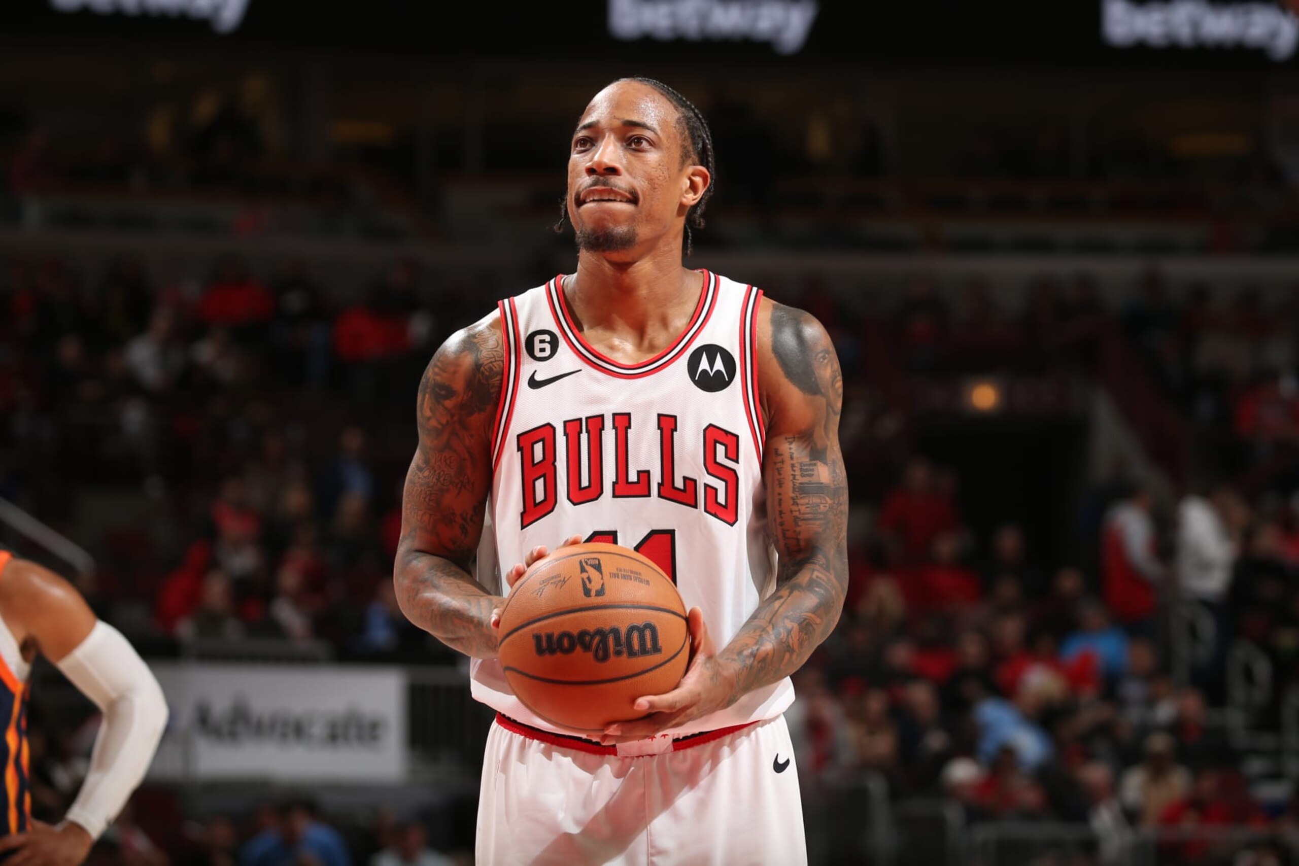 CHICAGO, IL - DECEMBER 14: DeMar DeRozan #11 of the Chicago Bulls prepares to shoot a free throw during the game against the New York Knicks on December 14, 2022 at United Center in Chicago, Illinois. NOTE TO USER: User expressly acknowledges and agrees that, by downloading and or using this photograph, User is consenting to the terms and conditions of the Getty Images License Agreement. Mandatory Copyright Notice: Copyright 2022 NBAE (Photo by Gary Dineen/NBAE via Getty Images)