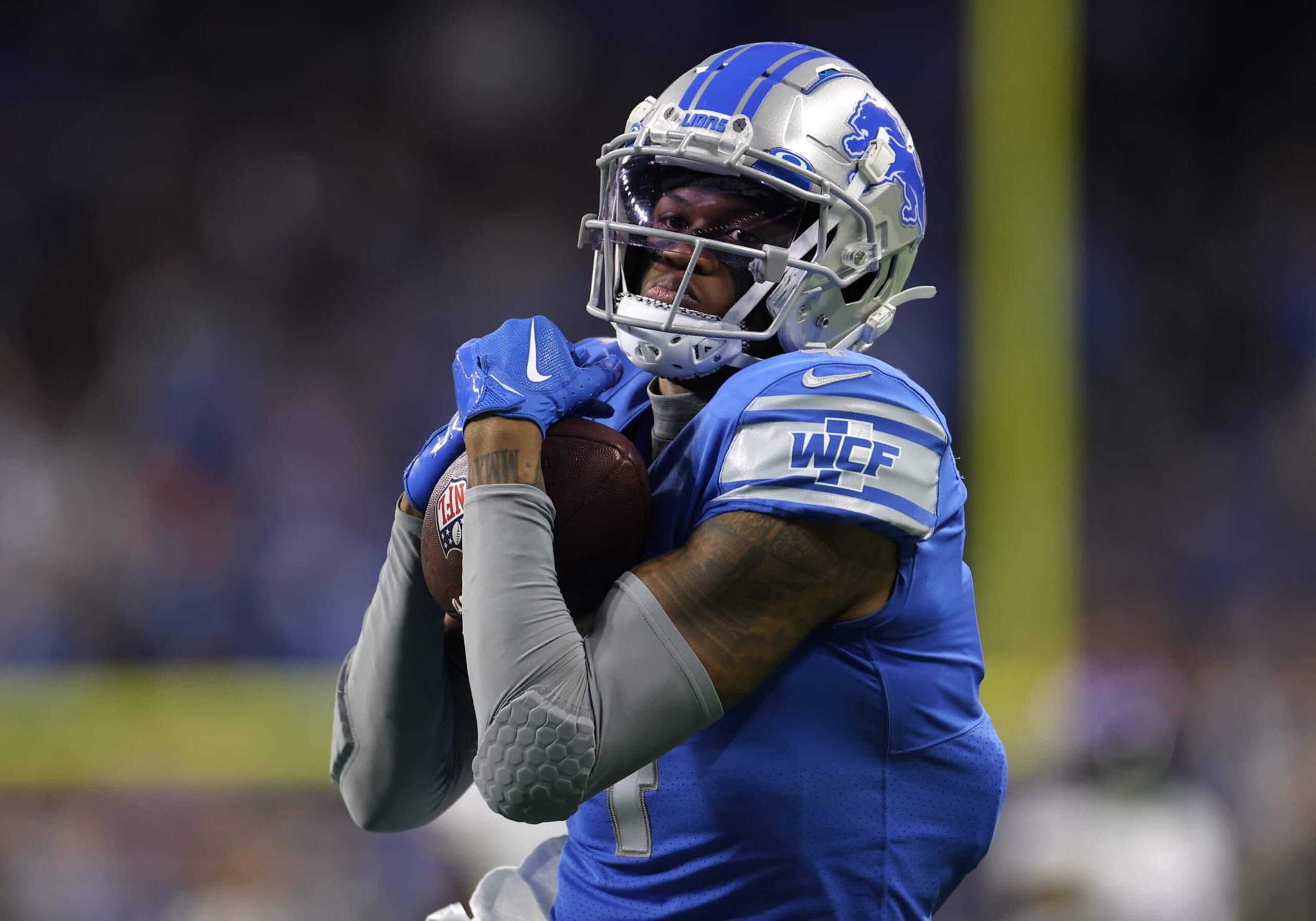 DETROIT, MICHIGAN - DECEMBER 11: DJ Chark #4 of the Detroit Lions scores a touchdown during the second quarter of the game against the Minnesota Vikings at Ford Field on December 11, 2022 in Detroit, Michigan. (Photo by Mike Mulholland/Getty Images)