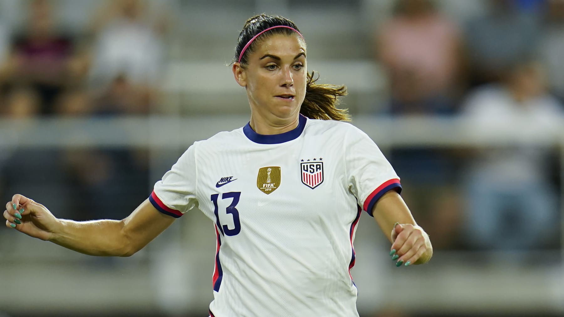 United States' Alex Morgan tries to control the ball against Nigeria during the second half of an international friendly soccer match, Tuesday, Sept. 6, 2022, in Washington. (AP Photo/Julio Cortez)