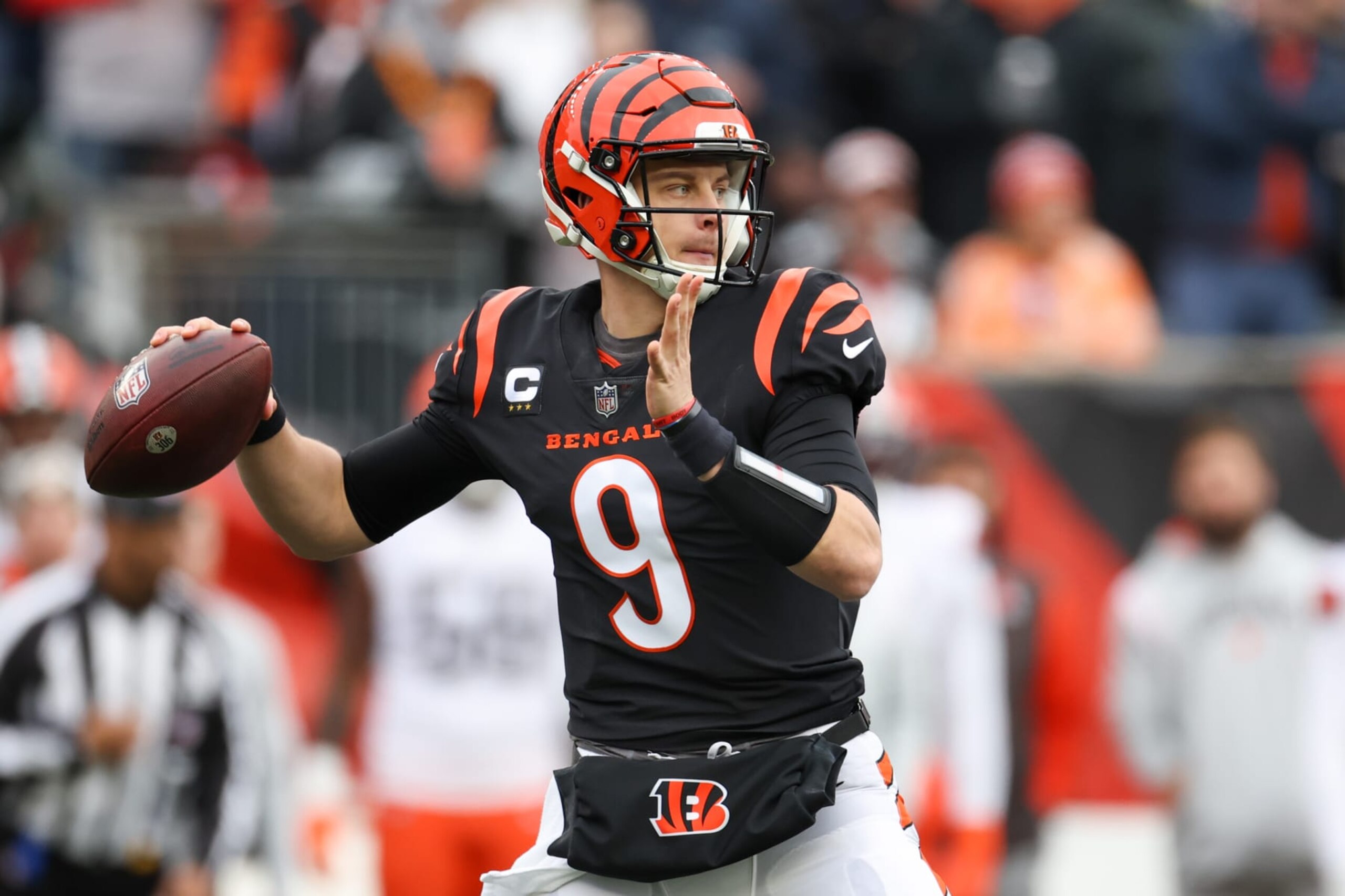 CINCINNATI, OH - DECEMBER 11: Cincinnati Bengals quarterback Joe Burrow (9) looks to pass during the game against the Cleveland Browns and the Cincinnati Bengals on December 11, 2022, at  Paycor Stadium in Cincinnati, OH. (Photo by Ian Johnson/Icon Sportswire via Getty Images)