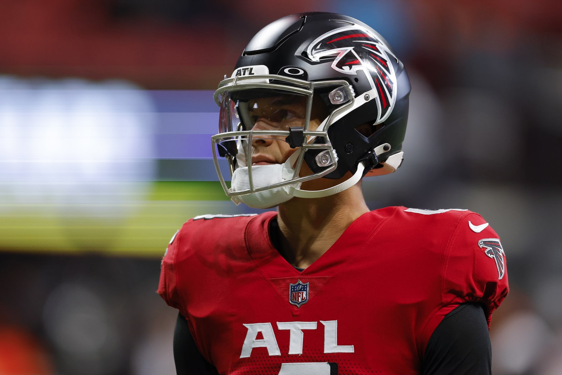 ATLANTA, GA - NOVEMBER 20: Desmond Ridder #4 of the Atlanta Falcons warms up prior to the game against the Chicago Bears at Mercedes-Benz Stadium on November 20, 2022 in Atlanta, Georgia. (Photo by Todd Kirkland/Getty Images)
