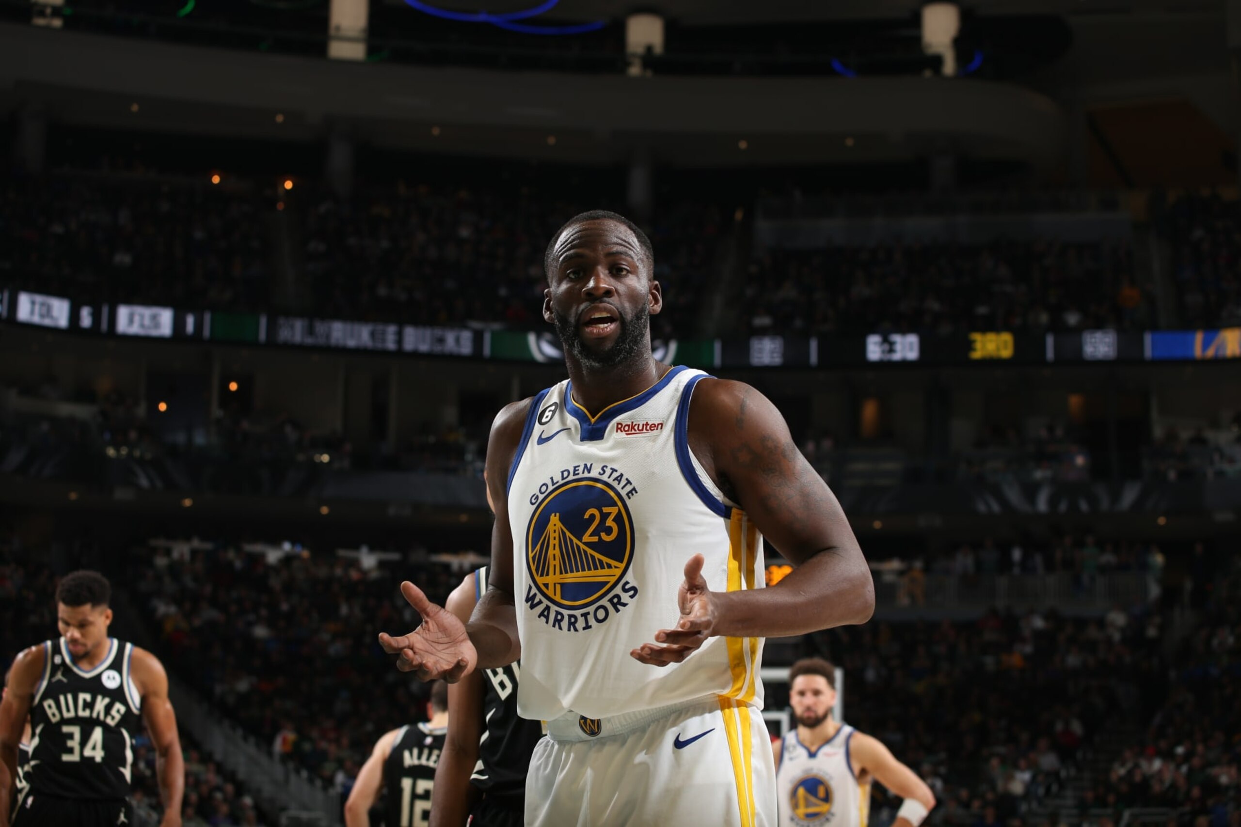 MILWAUKEE, WI - DECEMBER 13: Draymond Green #23 of the Golden State Warriors looks on during the game against the Milwaukee Bucks on December 13, 2022 at the Fiserv Forum Center in Milwaukee, Wisconsin. NOTE TO USER: User expressly acknowledges and agrees that, by downloading and or using this Photograph, user is consenting to the terms and conditions of the Getty Images License Agreement. Mandatory Copyright Notice: Copyright 2022 NBAE (Photo by Gary Dineen/NBAE via Getty Images).