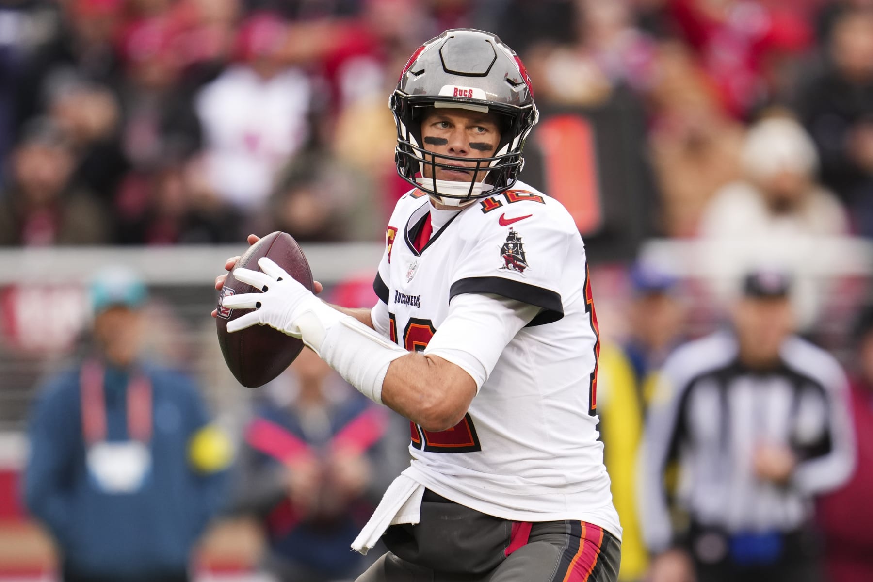 SANTA CLARA, CA - DECEMBER 11: Tom Brady #12 of the Tampa Bay Buccaneers throws against the San Francisco 49ers at Levi's Stadium on December 11, 2022 in Santa Clara, California. (Photo by Cooper Neill/Getty Images)