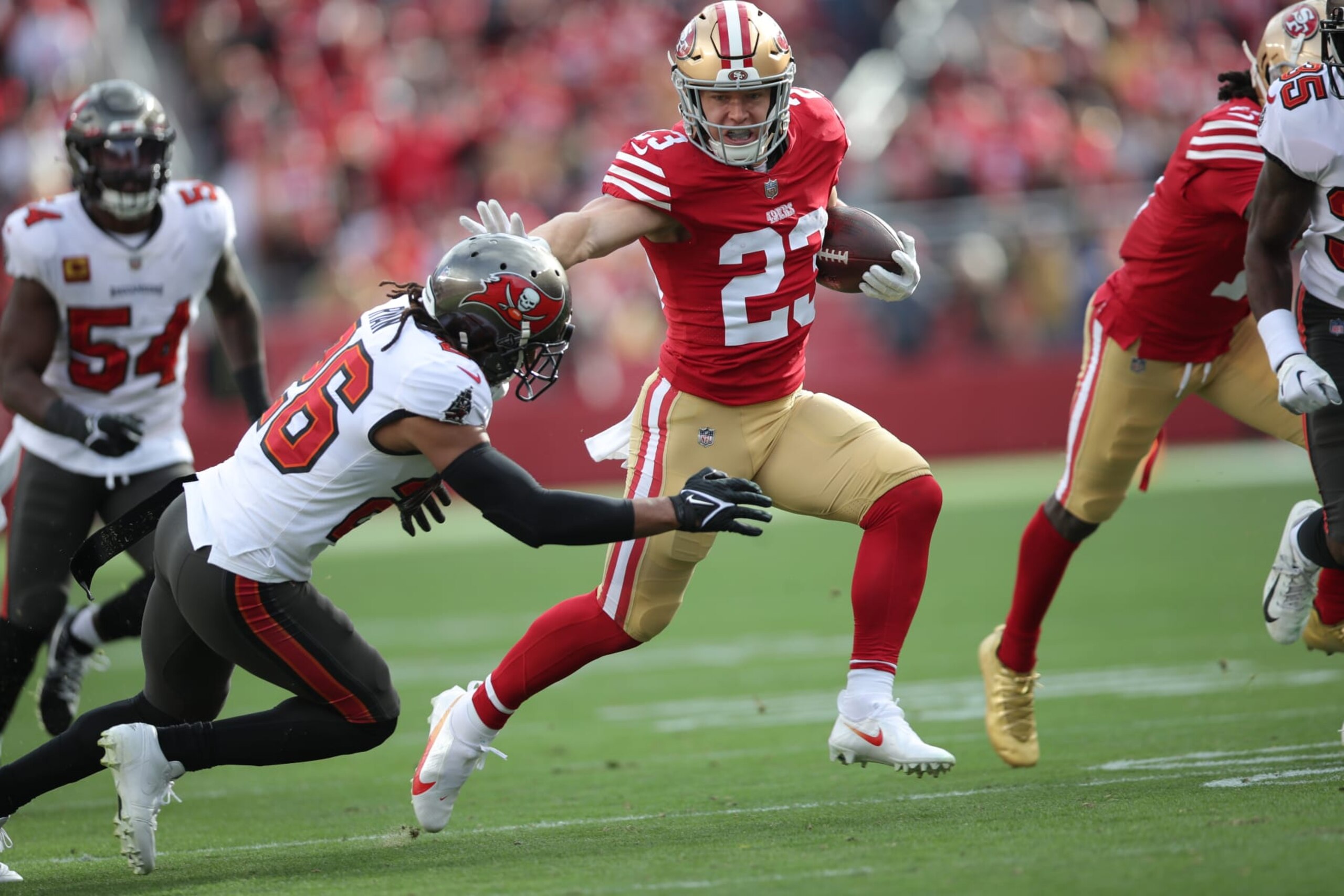 SANTA CLARA, CA - DECEMBER 11: Christian McCaffrey #23 of the San Francisco 49ers rushes during the game against the Tampa Bay Buccaneers at Levi's Stadium on December 11, 2022 in Santa Clara, California. The 49ers defeated the Buccaneers 35-7. (Photo by Michael Zagaris/San Francisco 49ers/Getty Images)