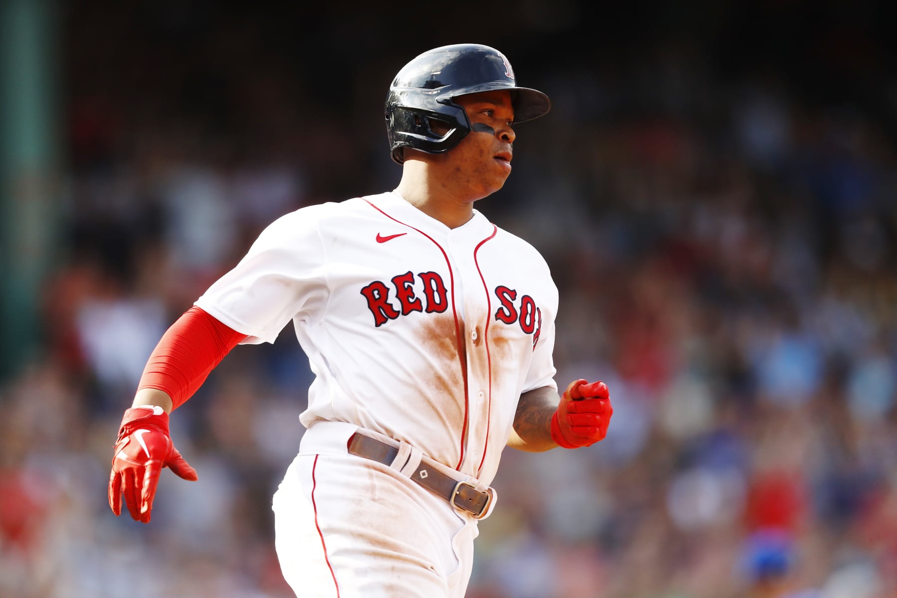BOSTON, MASSACHUSETTS - SEPTEMBER 18: Rafael Devers #11 of the Boston Red Sox runs on his two RBI single in the bottom of the fifth inning of the game against the Kansas City Royals at Fenway Park on September 18, 2022 in Boston, Massachusetts. (Photo by Omar Rawlings/Getty Images)