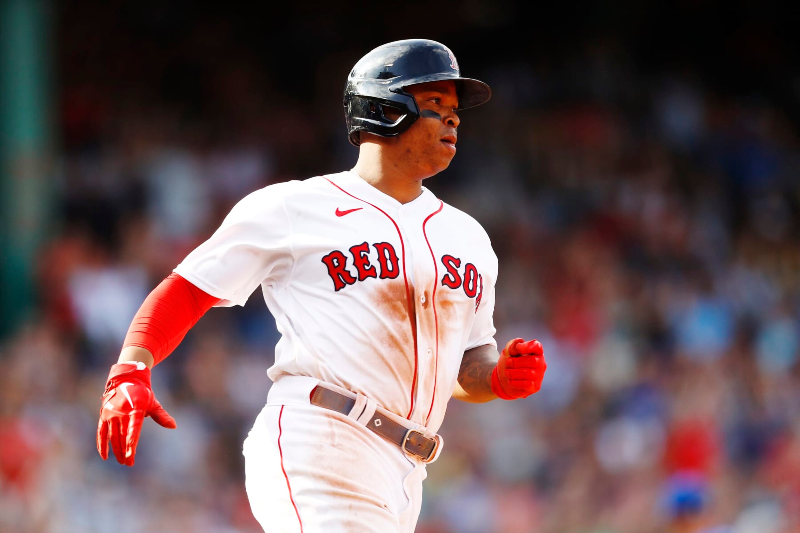 BOSTON, MASSACHUSETTS - SEPTEMBER 18: Rafael Devers #11 of the Boston Red Sox runs on his two RBI single in the bottom of the fifth inning of the game against the Kansas City Royals at Fenway Park on September 18, 2022 in Boston, Massachusetts. (Photo by Omar Rawlings/Getty Images)