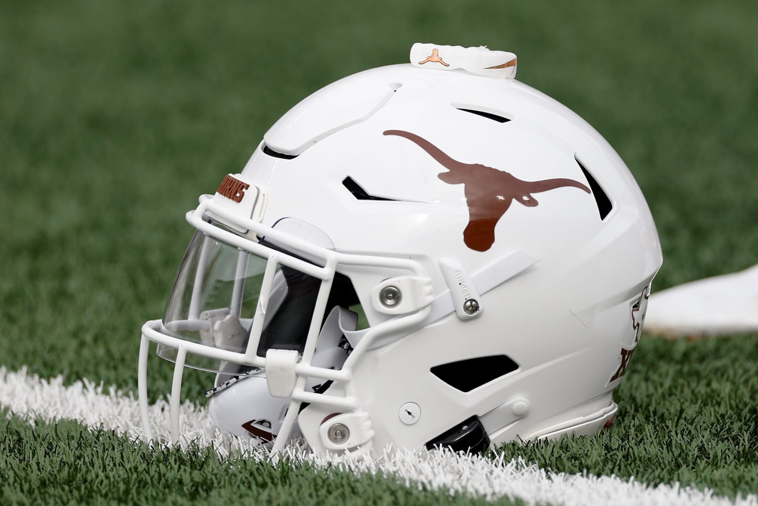 AUSTIN, TEXAS - OCTOBER 15: A Texas Longhorns helmet is seen on the turf before the game against the Iowa State Cyclones at Darrell K Royal-Texas Memorial Stadium on October 15, 2022 in Austin, Texas. (Photo by Tim Warner/Getty Images)