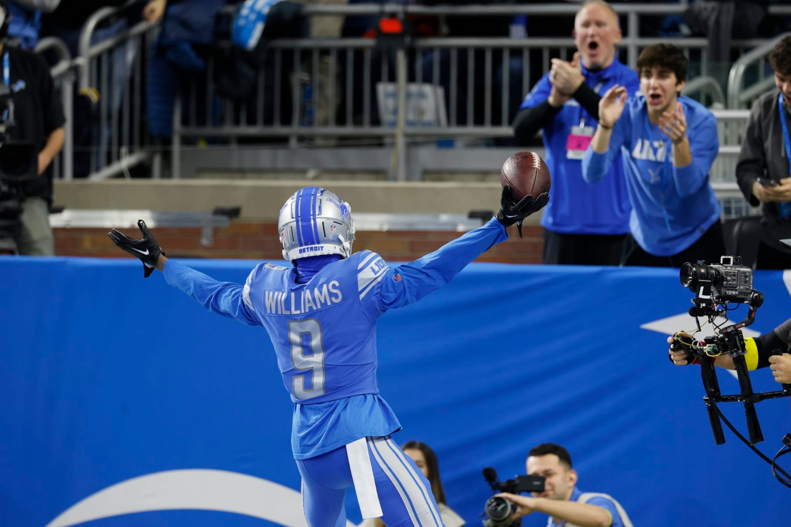 Detroit Lions' Jameson Williams reacts after catching a touchdown pass during the first half of an NFL football game against the Minnesota Vikings Sunday, Dec. 11, 2022, in Detroit. (AP Photo/Duane Burleson)