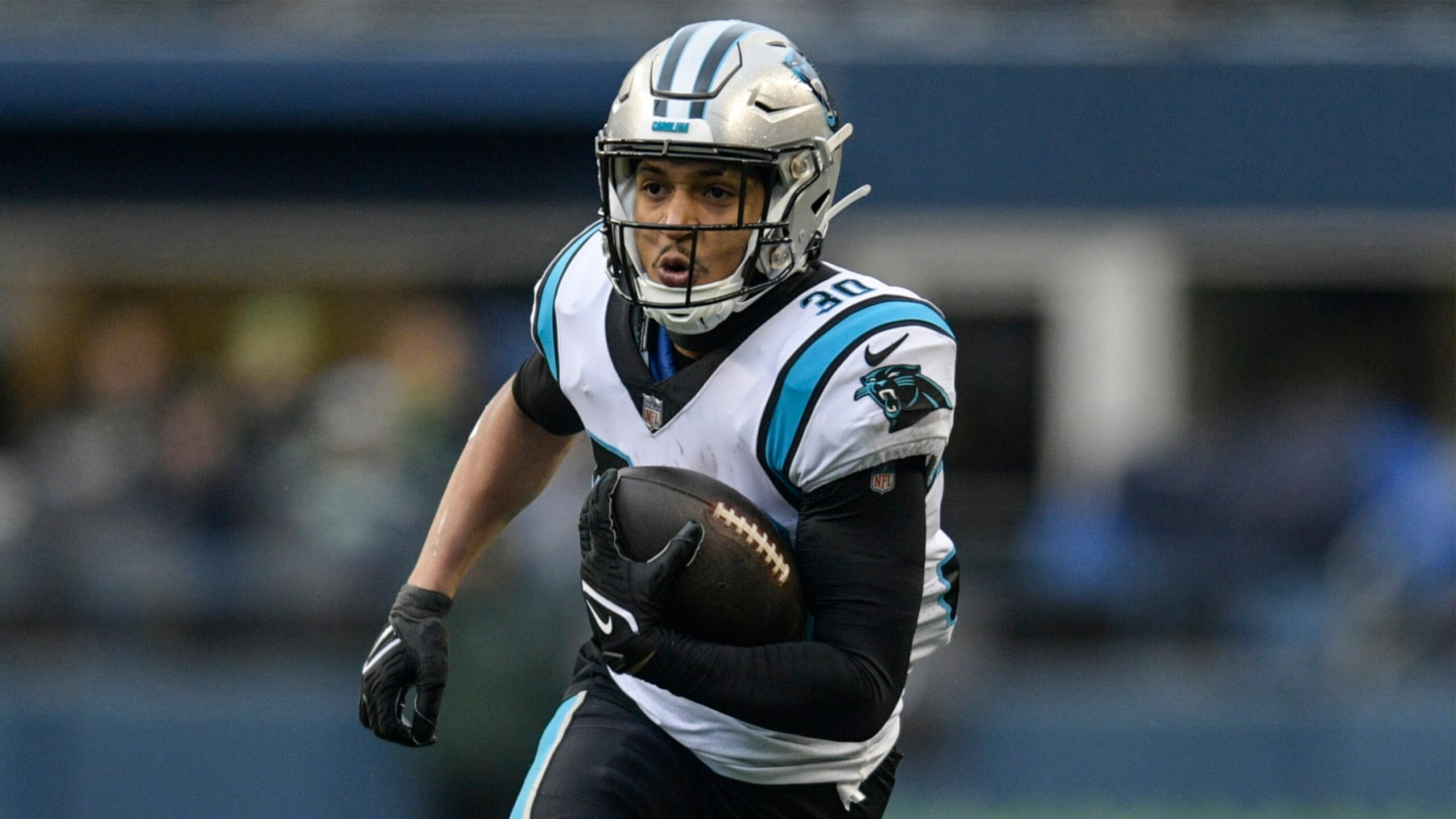Carolina Panthers running back Chuba Hubbard (30) runs Seattle Seahawks during the first half of an NFL football game, Sunday, Dec. 11, 2022, in Seattle. (AP Photo/Caean Couto)