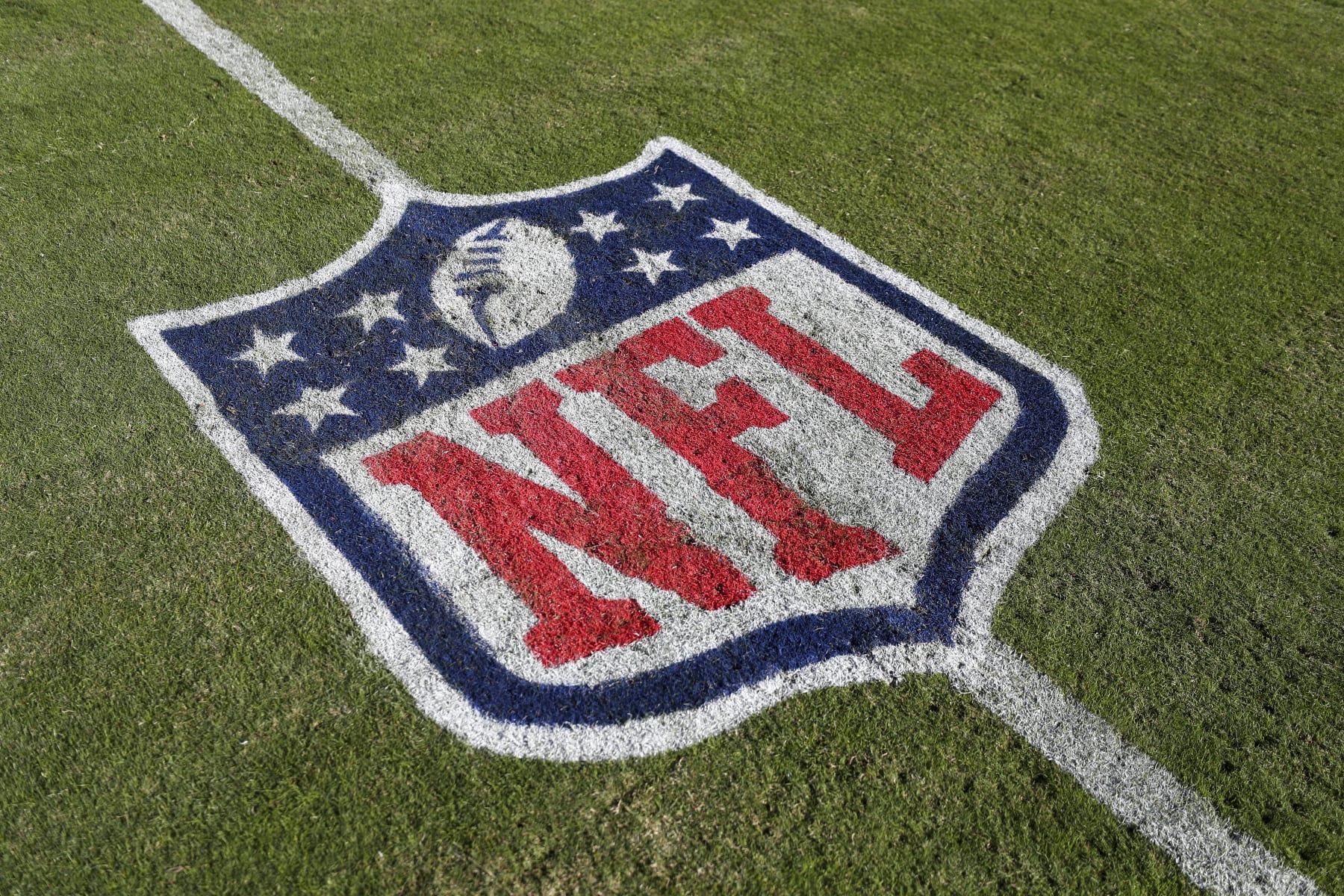 BALTIMORE, MD - NOVEMBER 20: A detail shot of an NFL logo painted on the field prior to an NFL football game between the Carolina Panthers and the Baltimore Ravens at M&T Bank Stadium on November 20, 2022 in Baltimore, Maryland. (Photo by Kevin Sabitus/Getty Images)