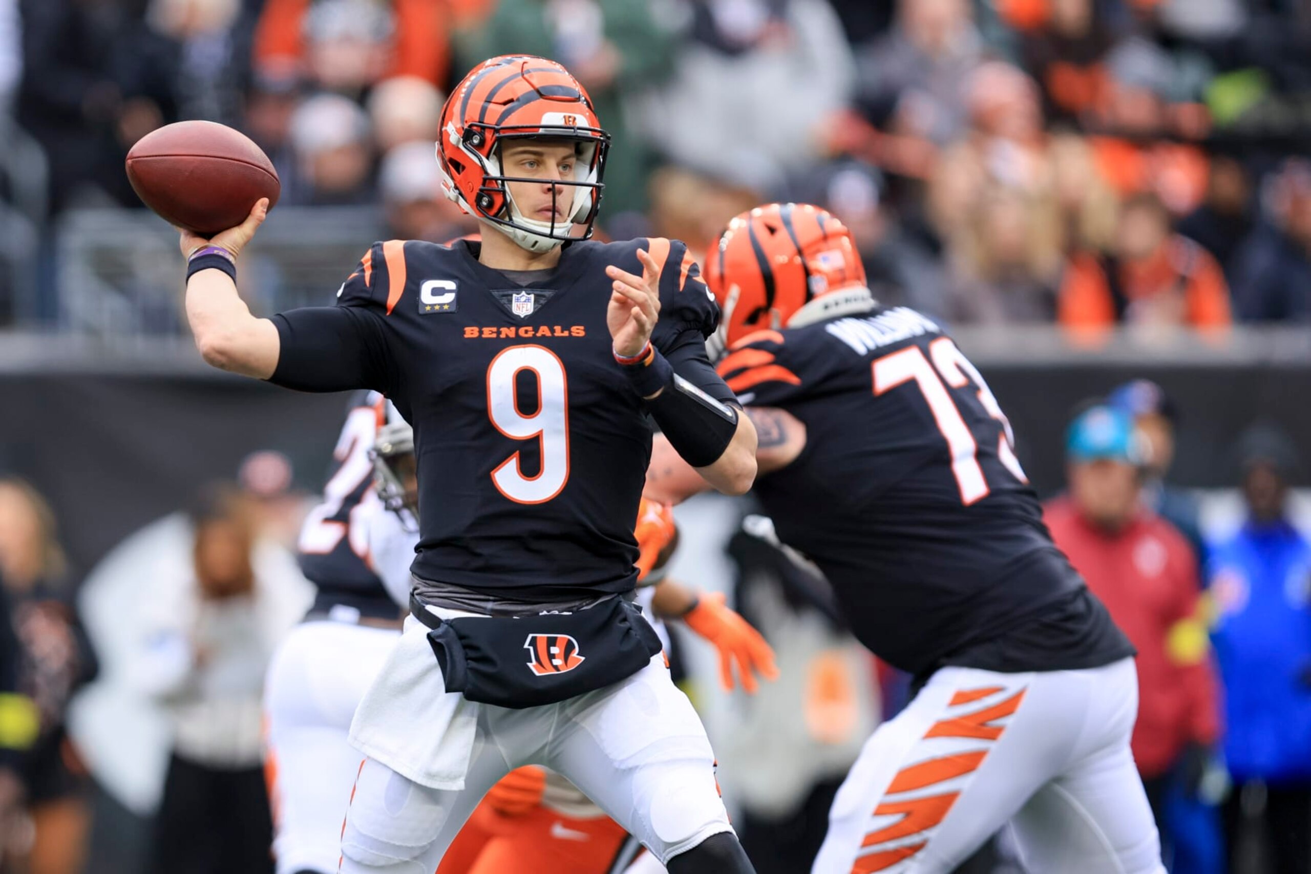 Cincinnati Bengals quarterback Joe Burrow (9) throws a pass during an NFL football game against the Cleveland Browns, Sunday, Dec. 11, 2022, in Cincinnati. Cincinnati won 23-10. (AP Photo/Aaron Doster)