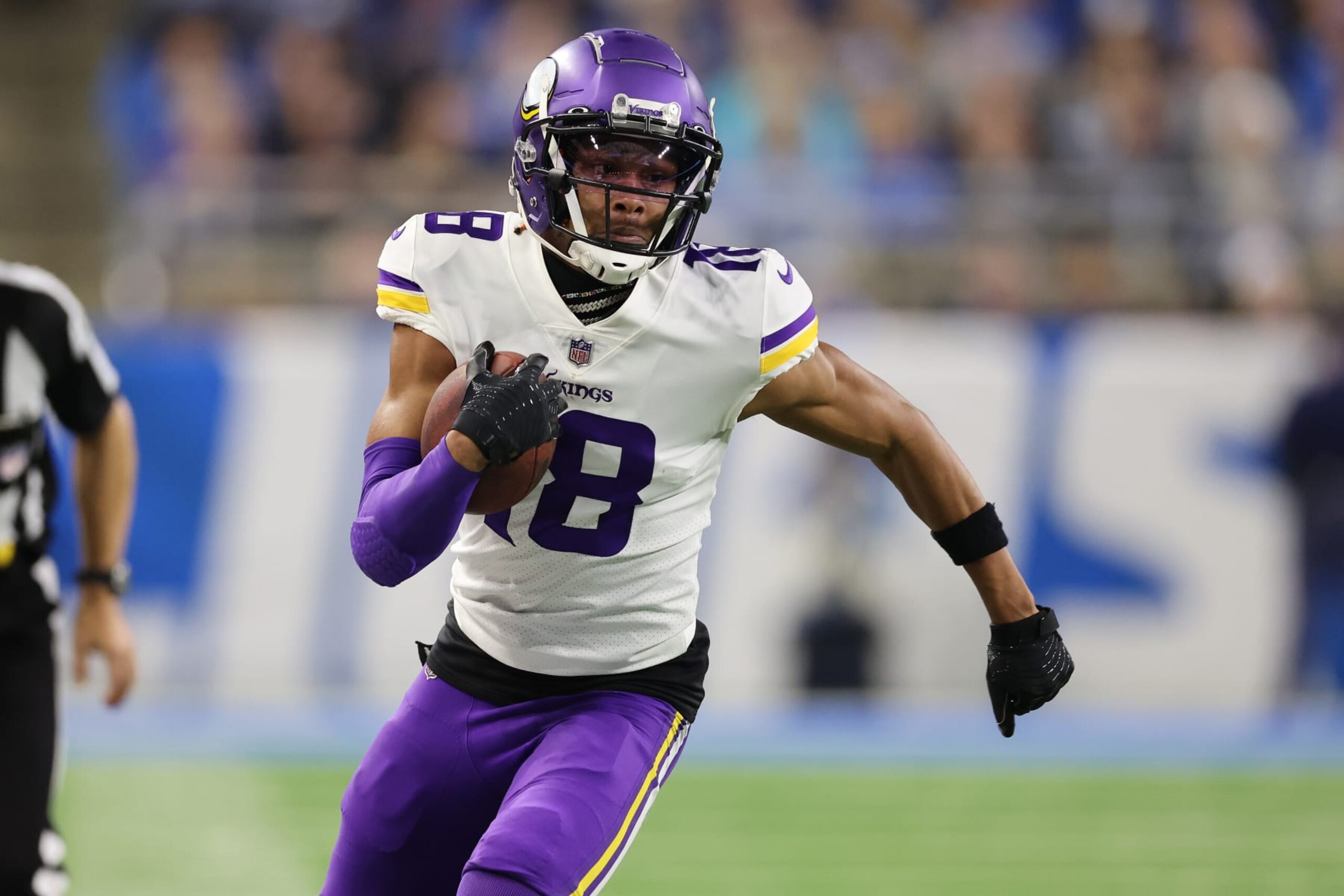 DETROIT, MICHIGAN - DECEMBER 11: Justin Jefferson #18 of the Minnesota Vikings plays against the Detroit Lions at Ford Field on December 11, 2022 in Detroit, Michigan. (Photo by Gregory Shamus/Getty Images)