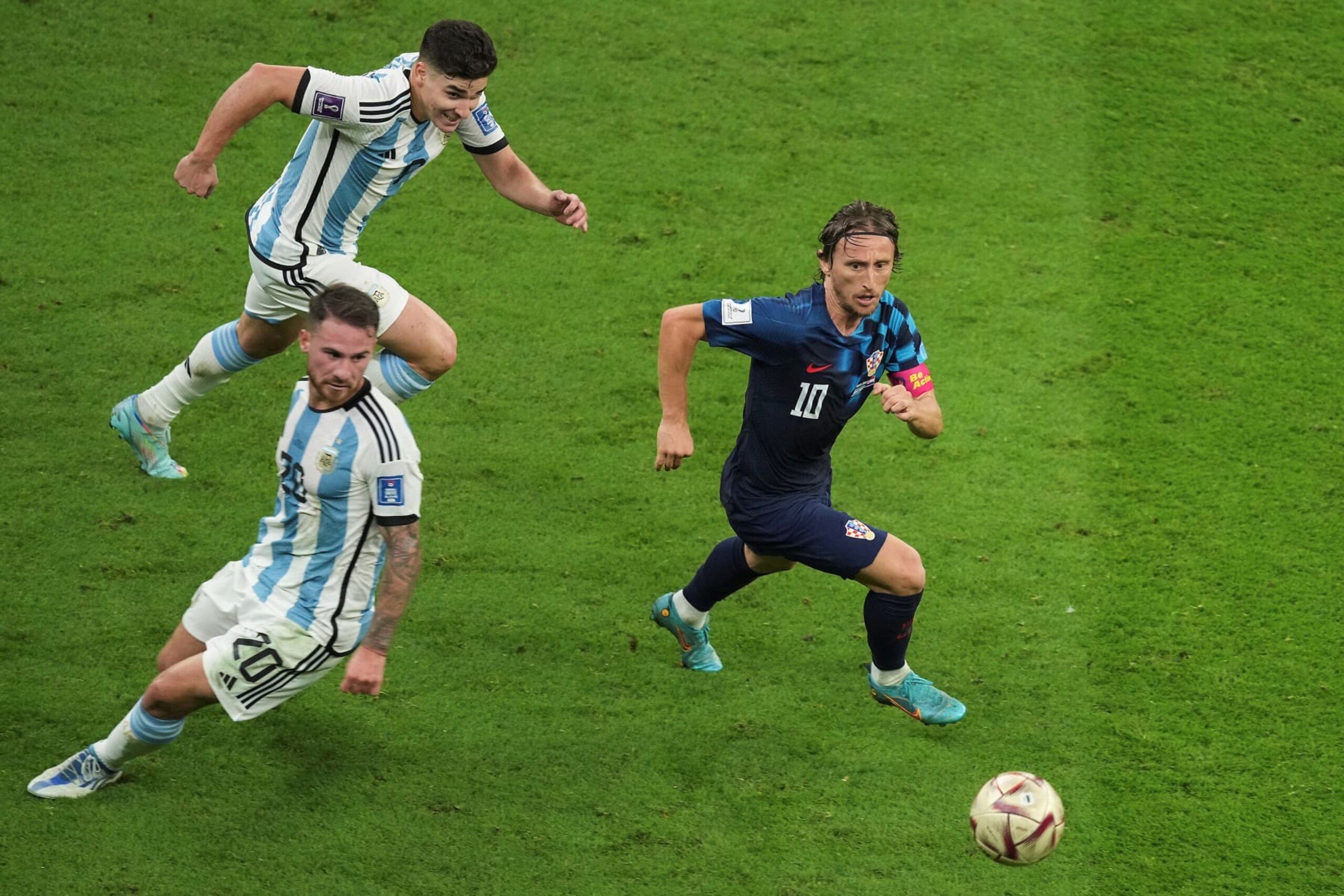 Luka Modric R of Croatia competes during the Semifinal between Argentina and Croatia at the 2022 FIFA World Cup at Lusail Stadium in Lusail, Qatar, Dec. 13, 2022. (Photo by Pan Yulong/Xinhua via Getty Images)