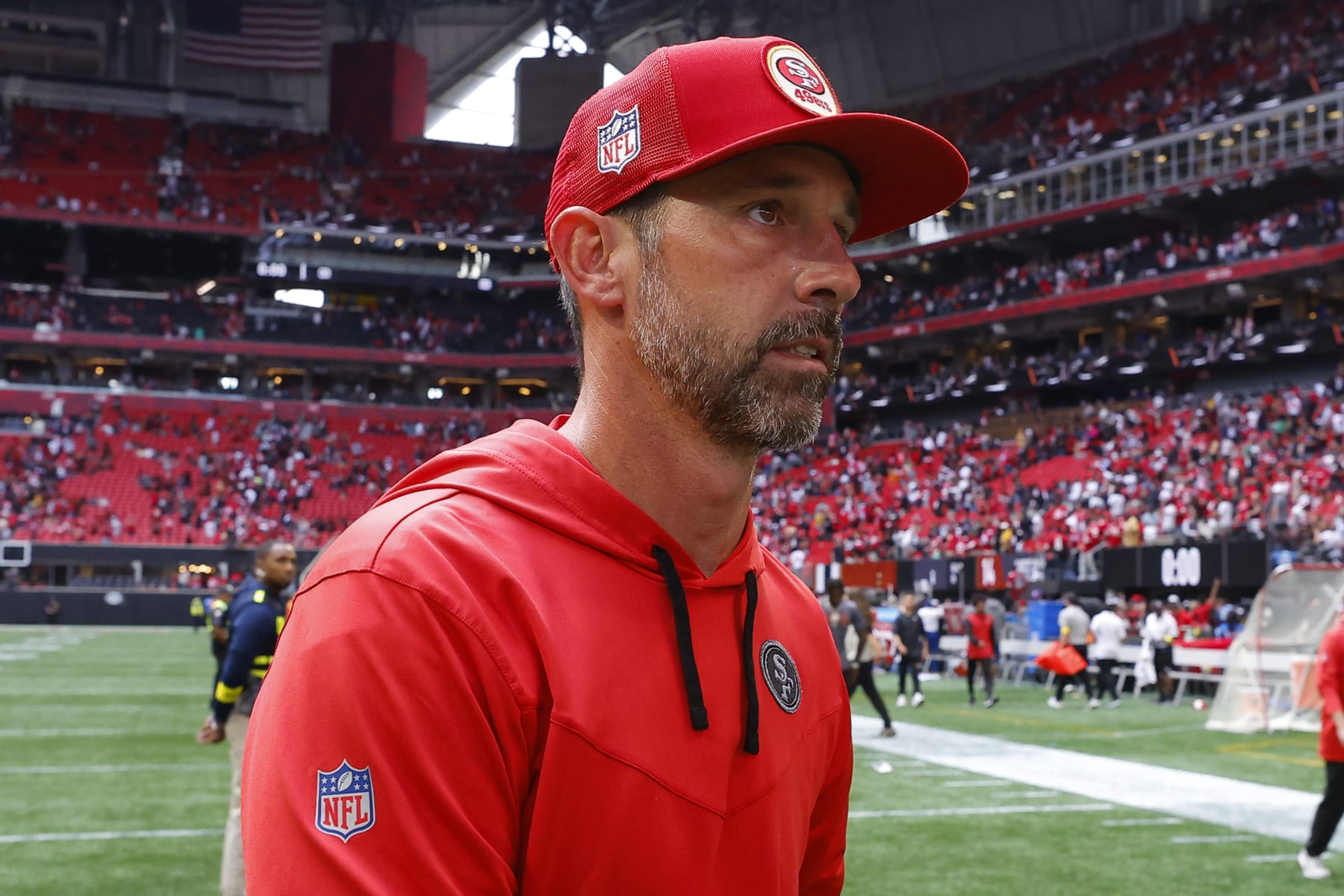 ATLANTA, GA - OCTOBER 16: Head coach Kyle Shanahan of the San Francisco 49ers leaves the field following the game against the Atlanta Falcons at Mercedes-Benz Stadium on October 16, 2022 in Atlanta, Georgia. (Photo by Todd Kirkland/Getty Images)