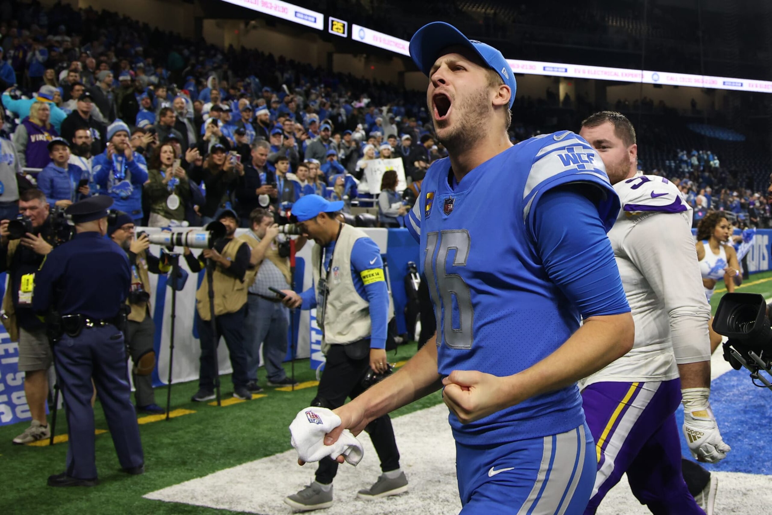 DETROIT, MICHIGAN - DECEMBER 11: Jared Goff #16 of the Detroit Lions celebrates after defeating the Minnesota Vikings at Ford Field on December 11, 2022 in Detroit, Michigan. (Photo by Mike Mulholland/Getty Images)